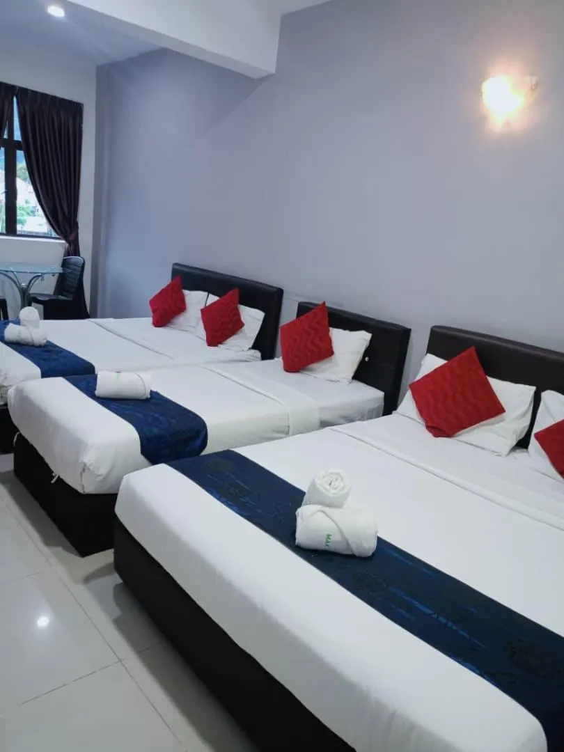 Bed in Max Ferringhi Hotel