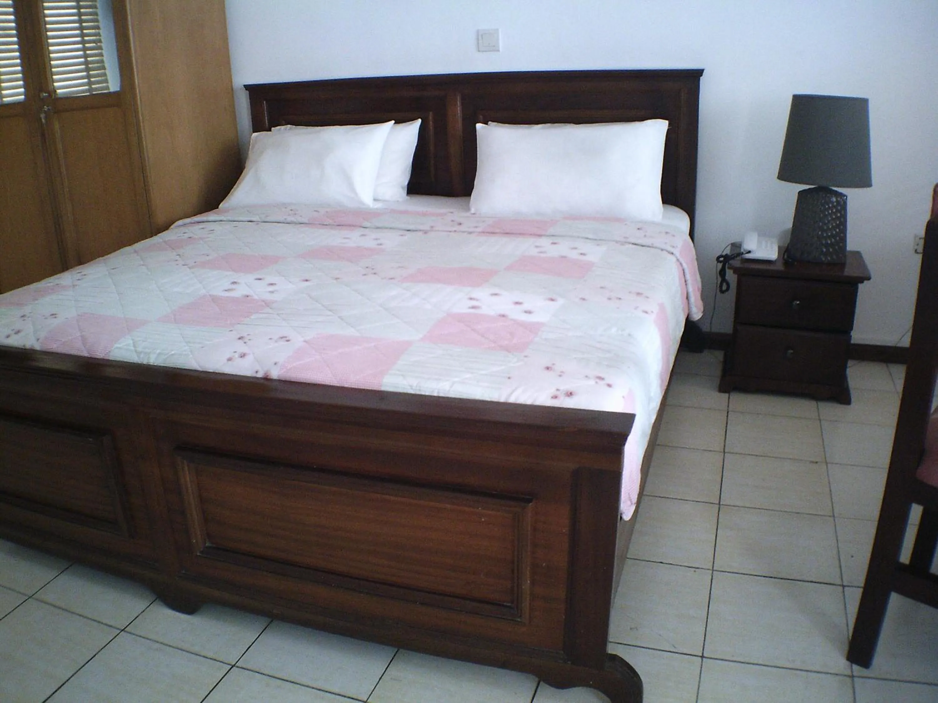 Bed in Lavender Lodge Hotel