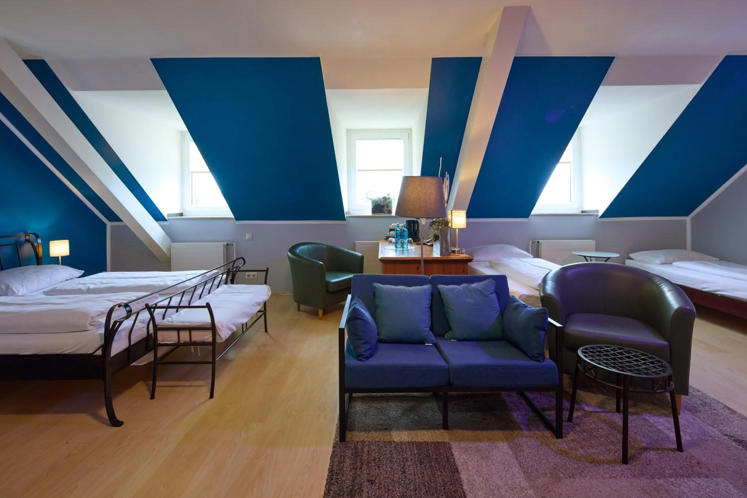 Living room, Bed in TRIP INN PostHotel Düren