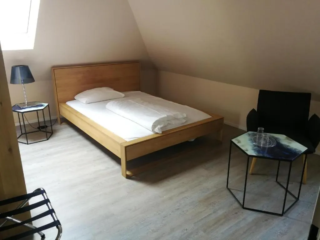 Photo of the whole room, Bed in TRIP INN PostHotel Düren