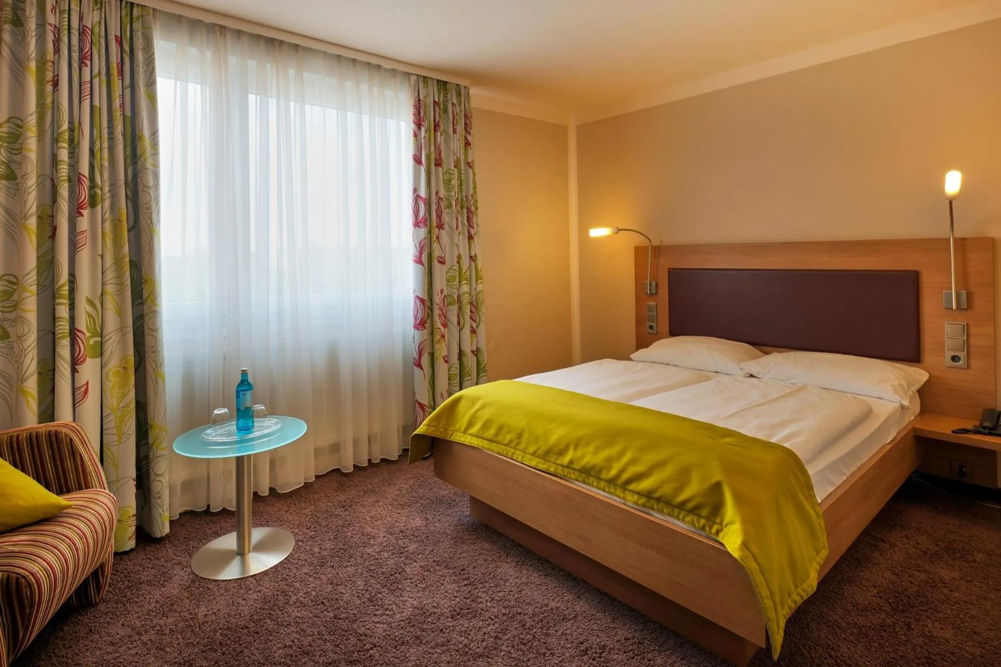 Bed in TRIP INN PostHotel Düren