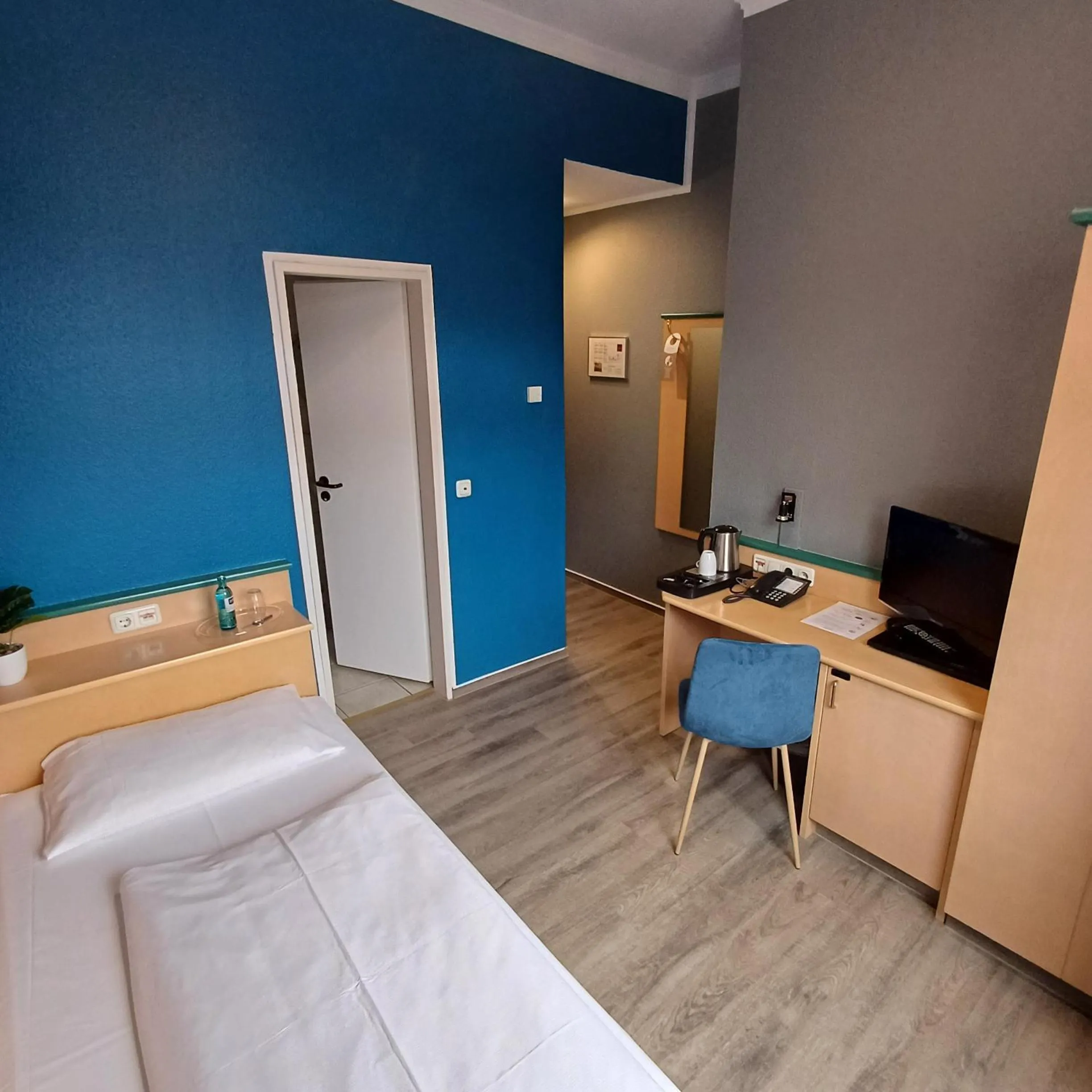 Bed in TRIP INN PostHotel Düren