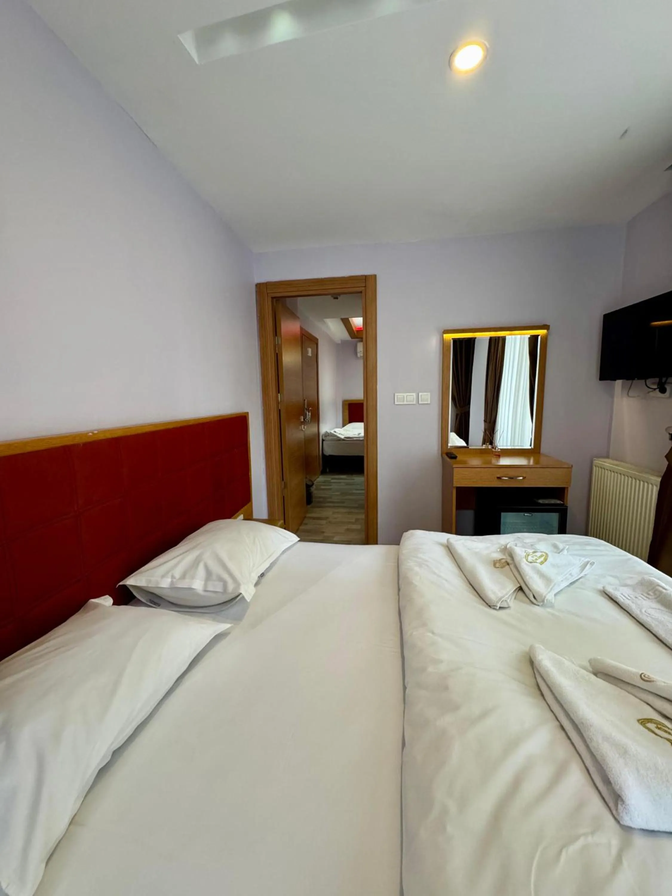 Bed in Gulhane Corner Hotel