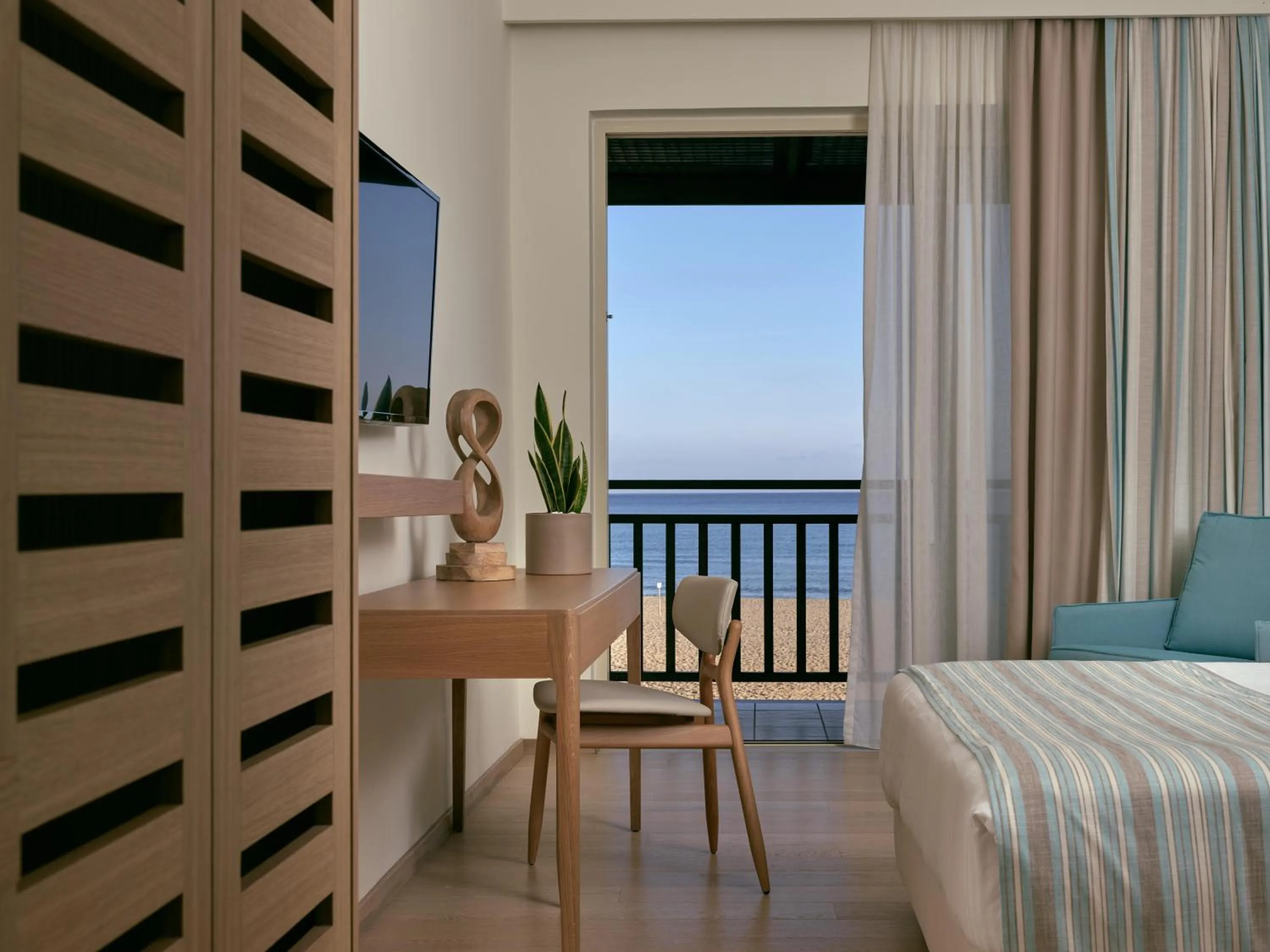 Photo of the whole room, Bed in Pilot Beach Resort