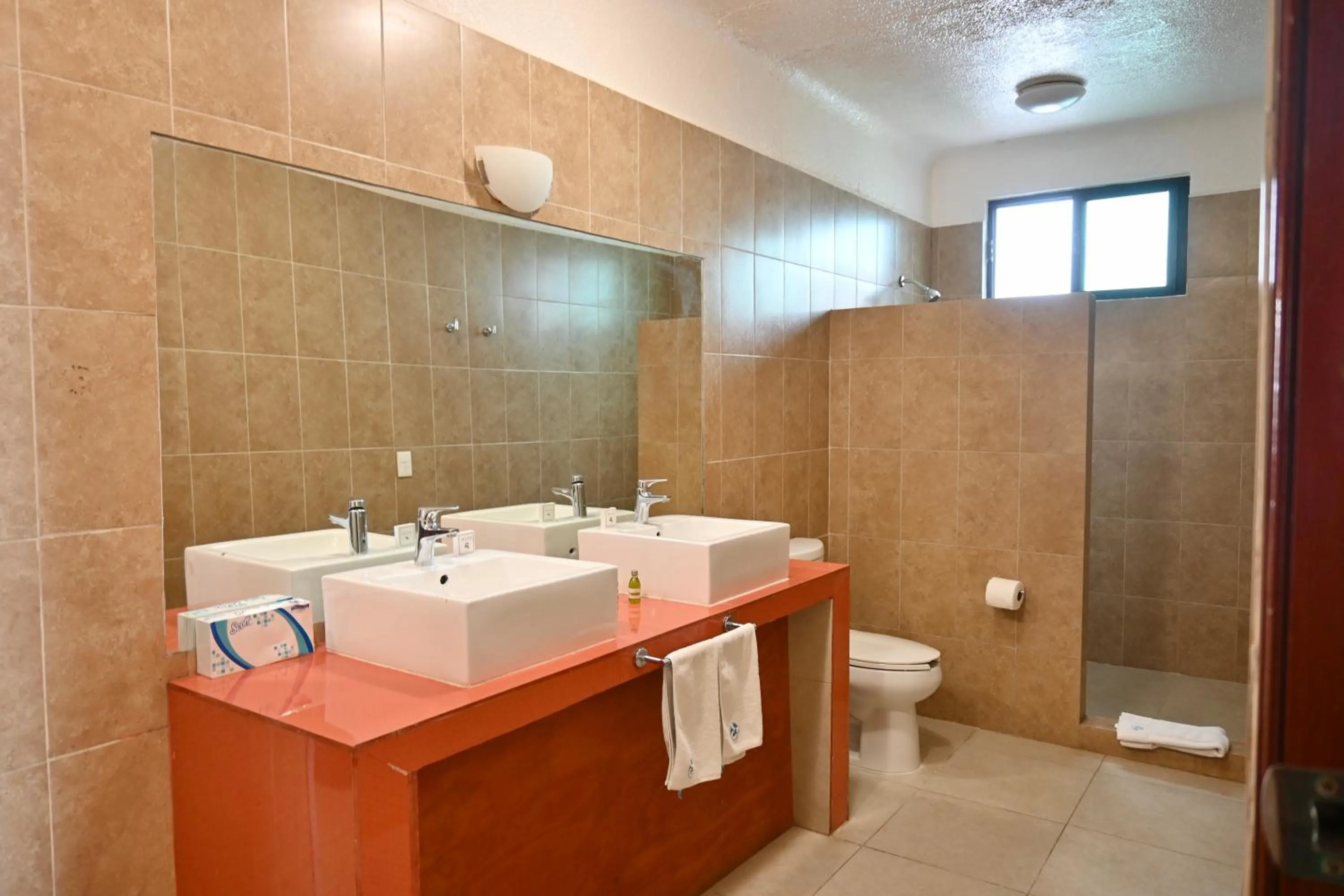 Shower in Pelicano Inn Playa del Carmen - Beachfront Hotel