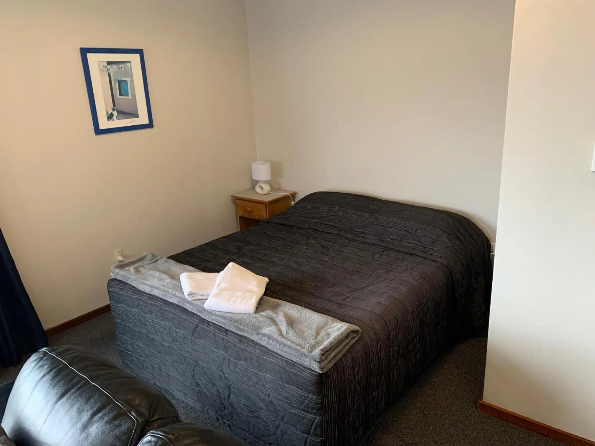 Bed in Red Tussock Motel