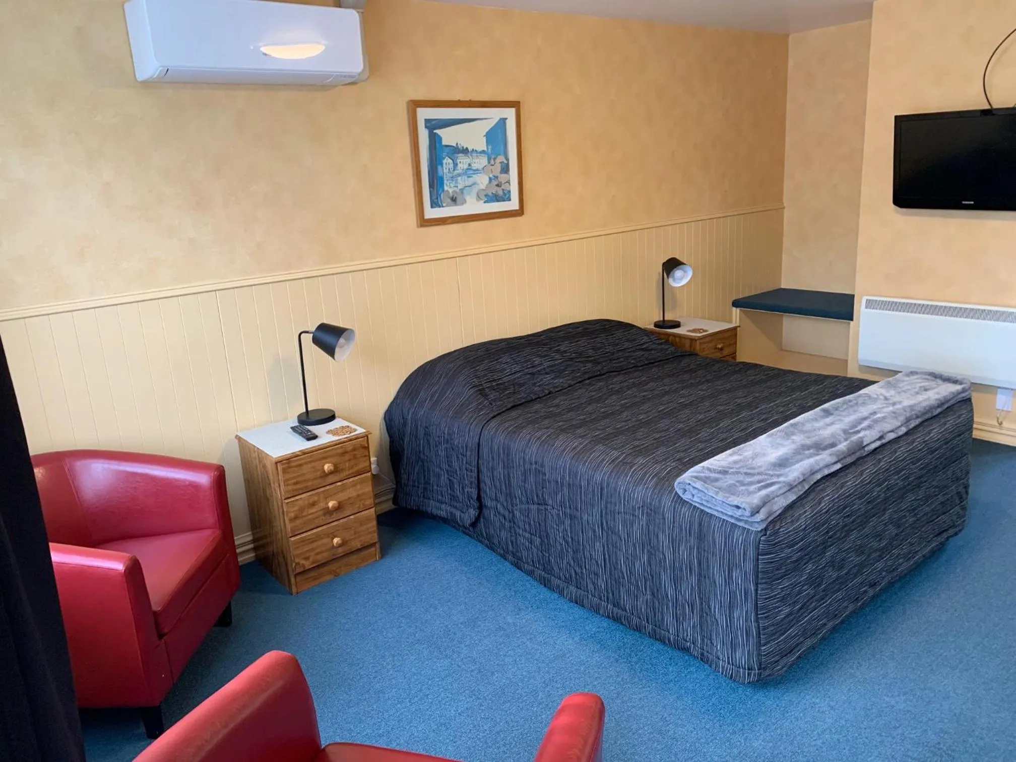 Bed in Red Tussock Motel