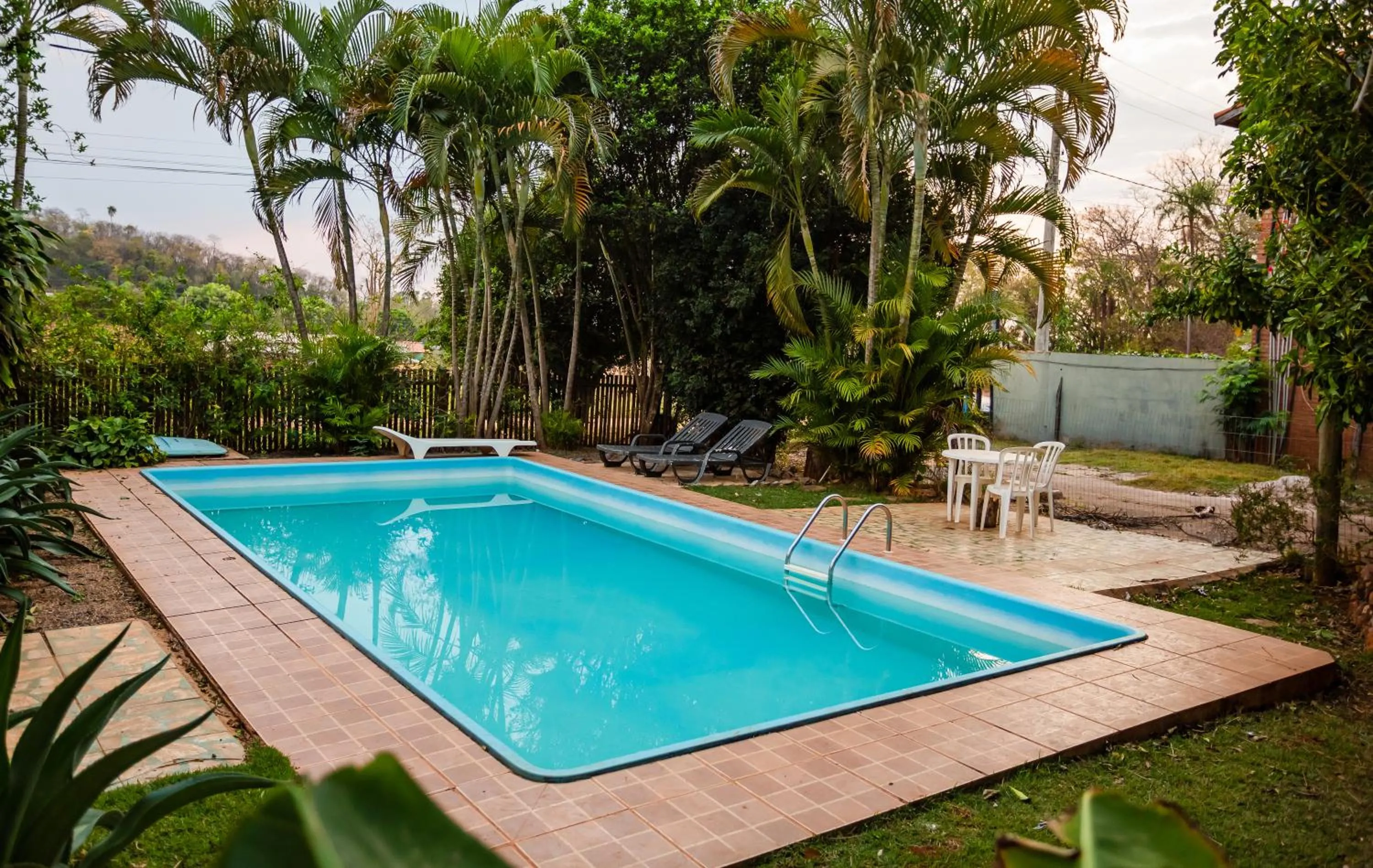 Swimming pool in Pousada Chão de pedra