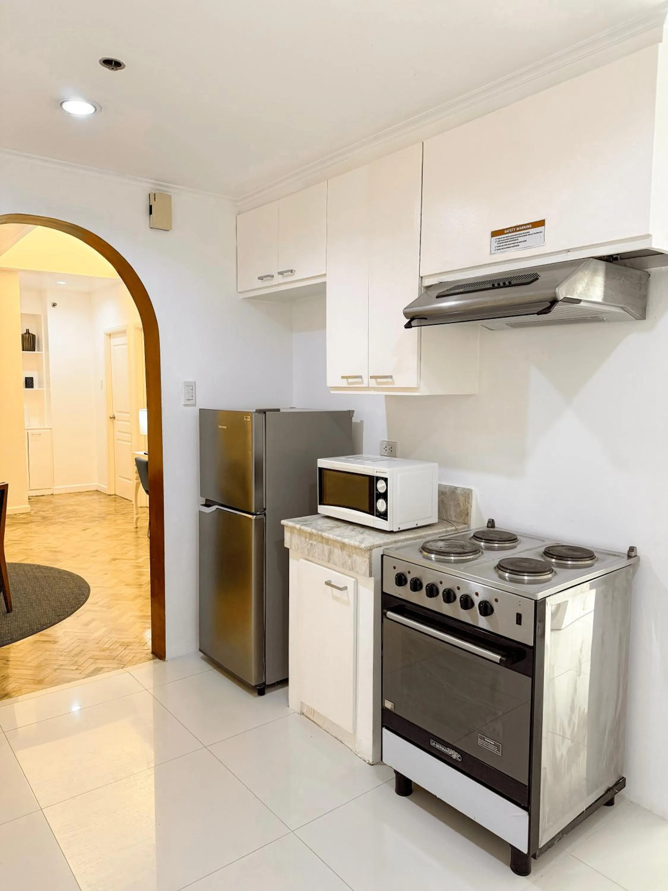 Kitchen or kitchenette in Parque España Residence Hotel