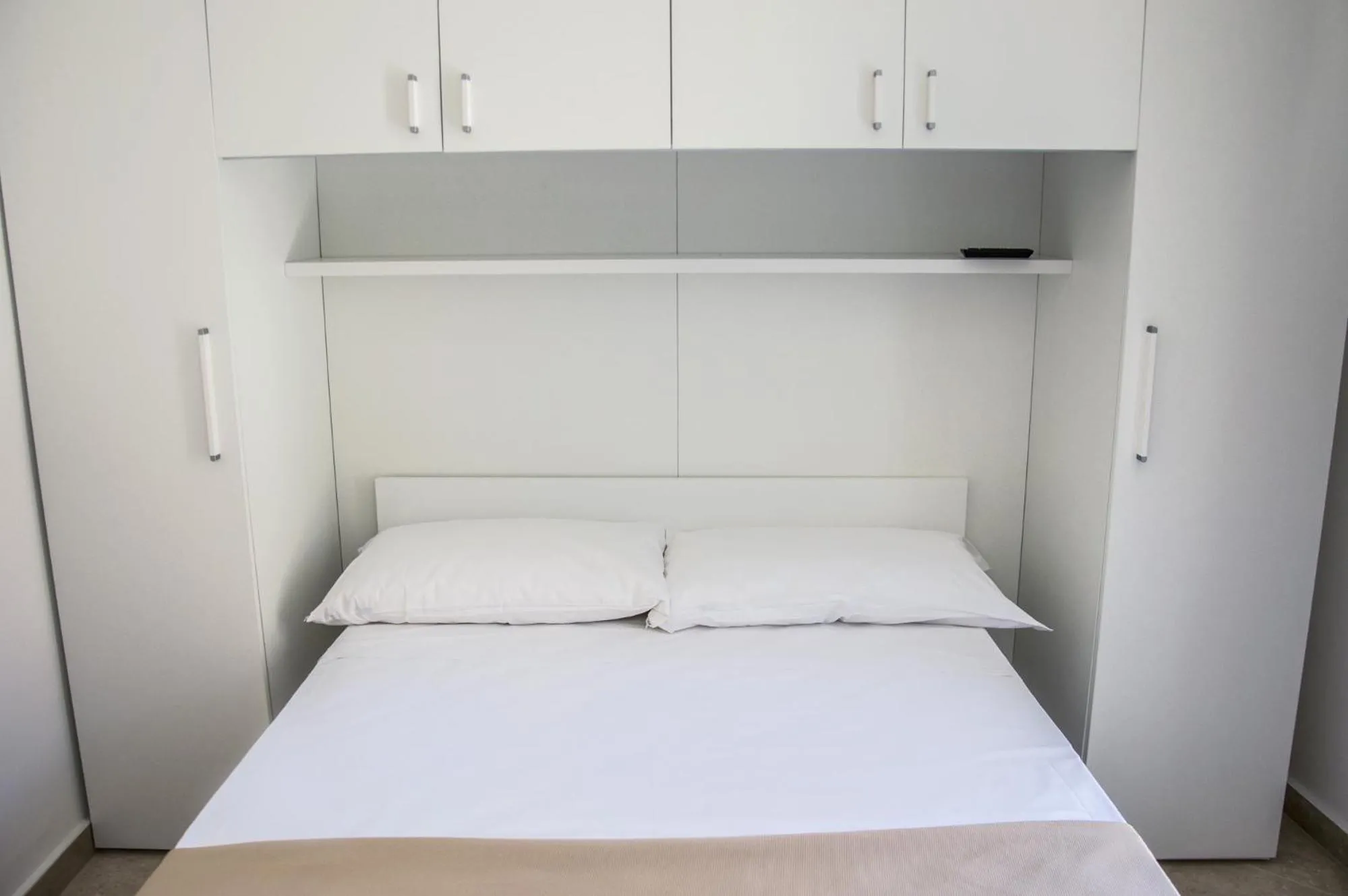Bed in Sunrise Guest House