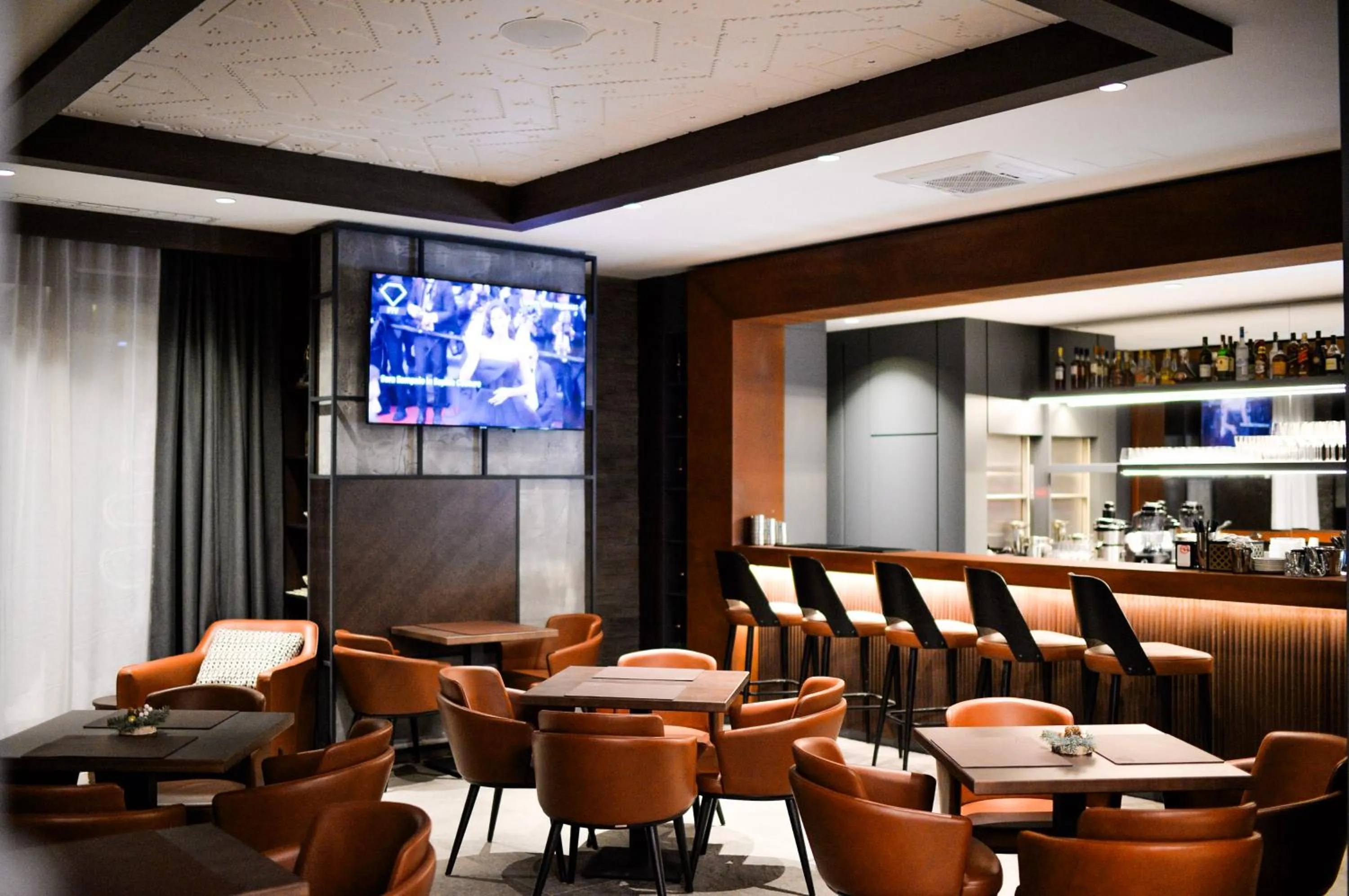 Communal lounge/ TV room in Vila Apartments Wellness&Spa