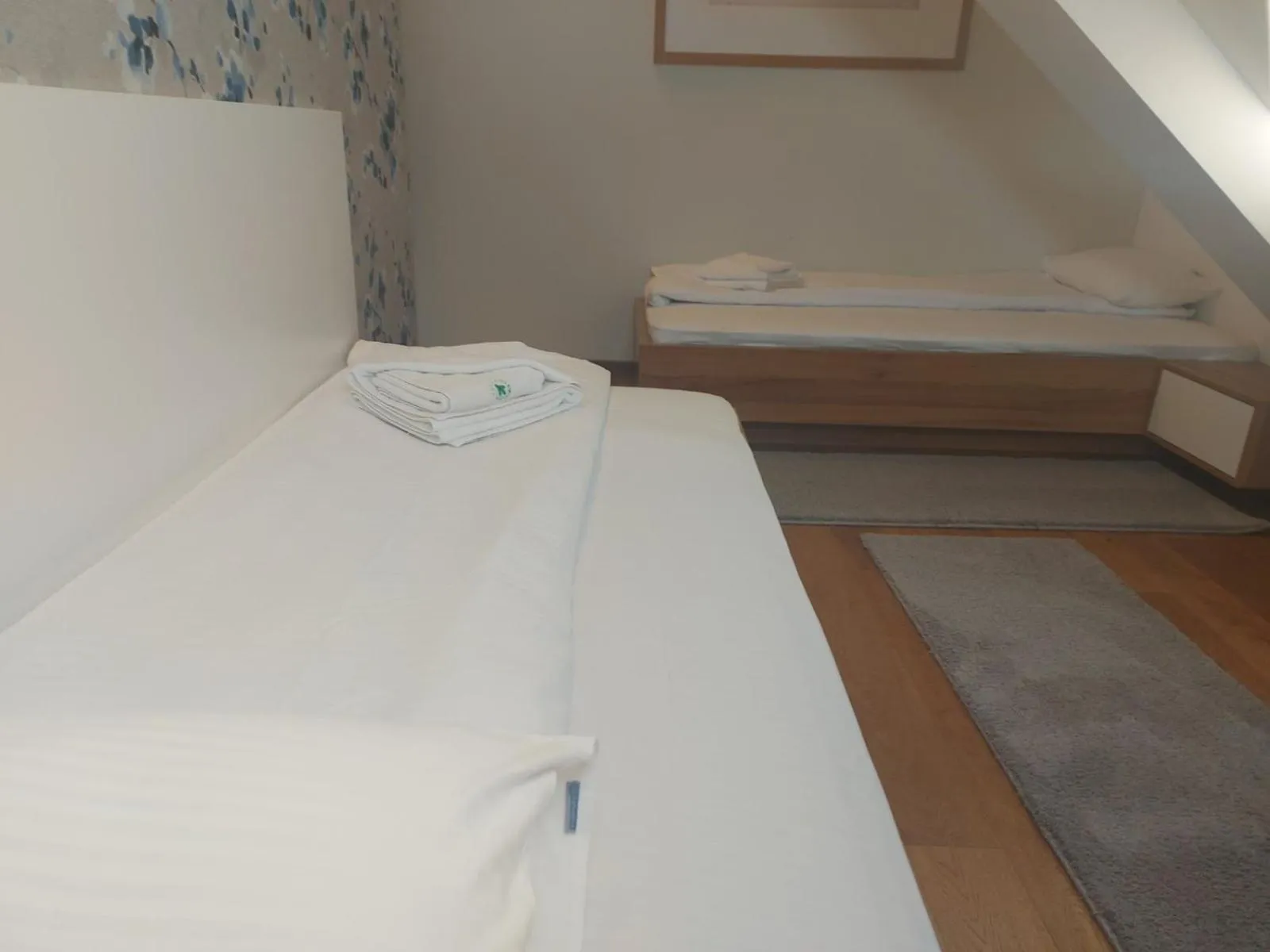 Bed in Vila Apartments Wellness&Spa