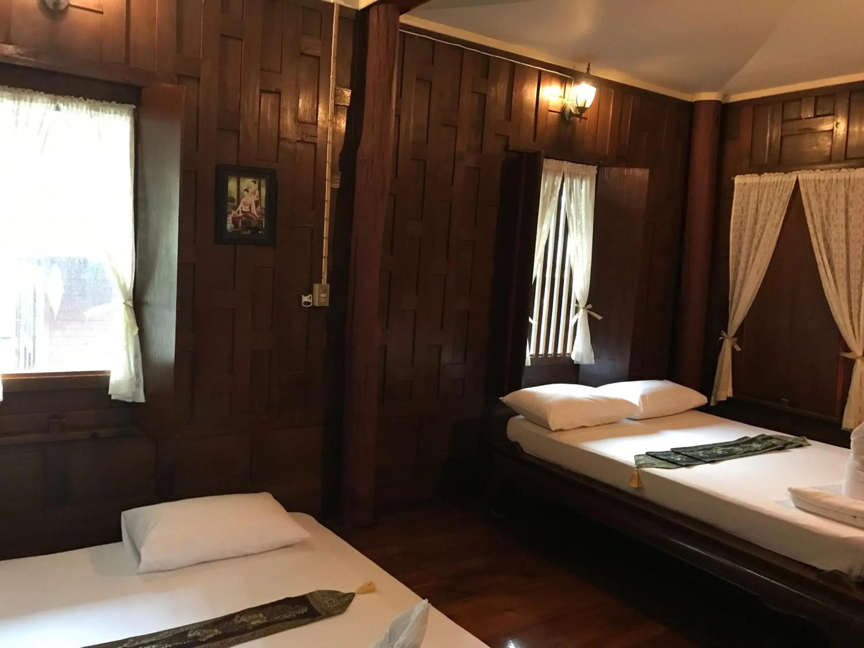 Bed in บ้านกรนรา Baan Kornnara Bed in บ้านกรนรา Baan Kornnara