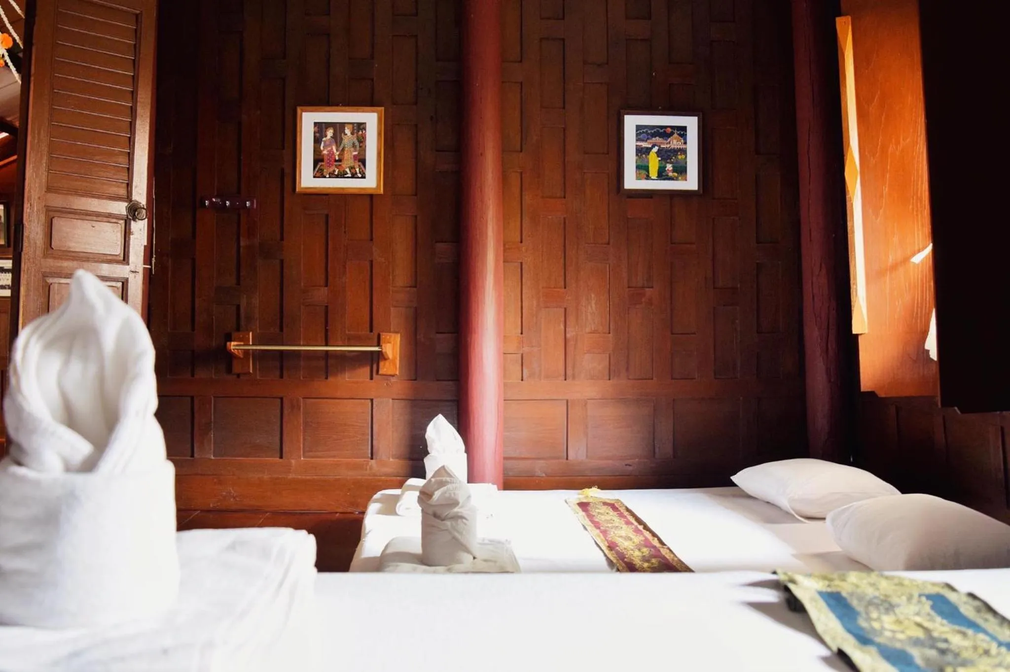 Bed in บ้านกรนรา Baan Kornnara