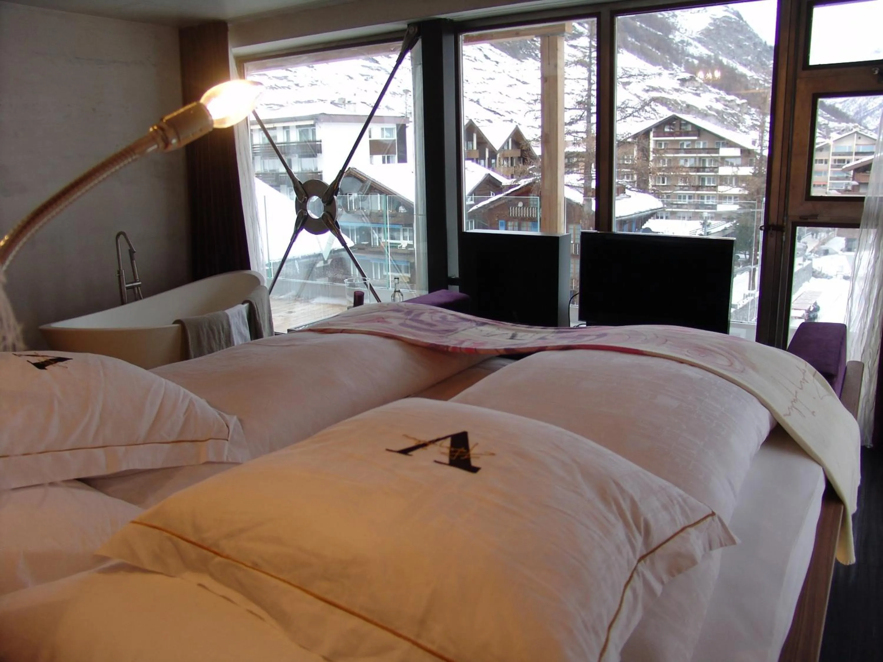 Bed in Backstage Boutique SPA Hotel