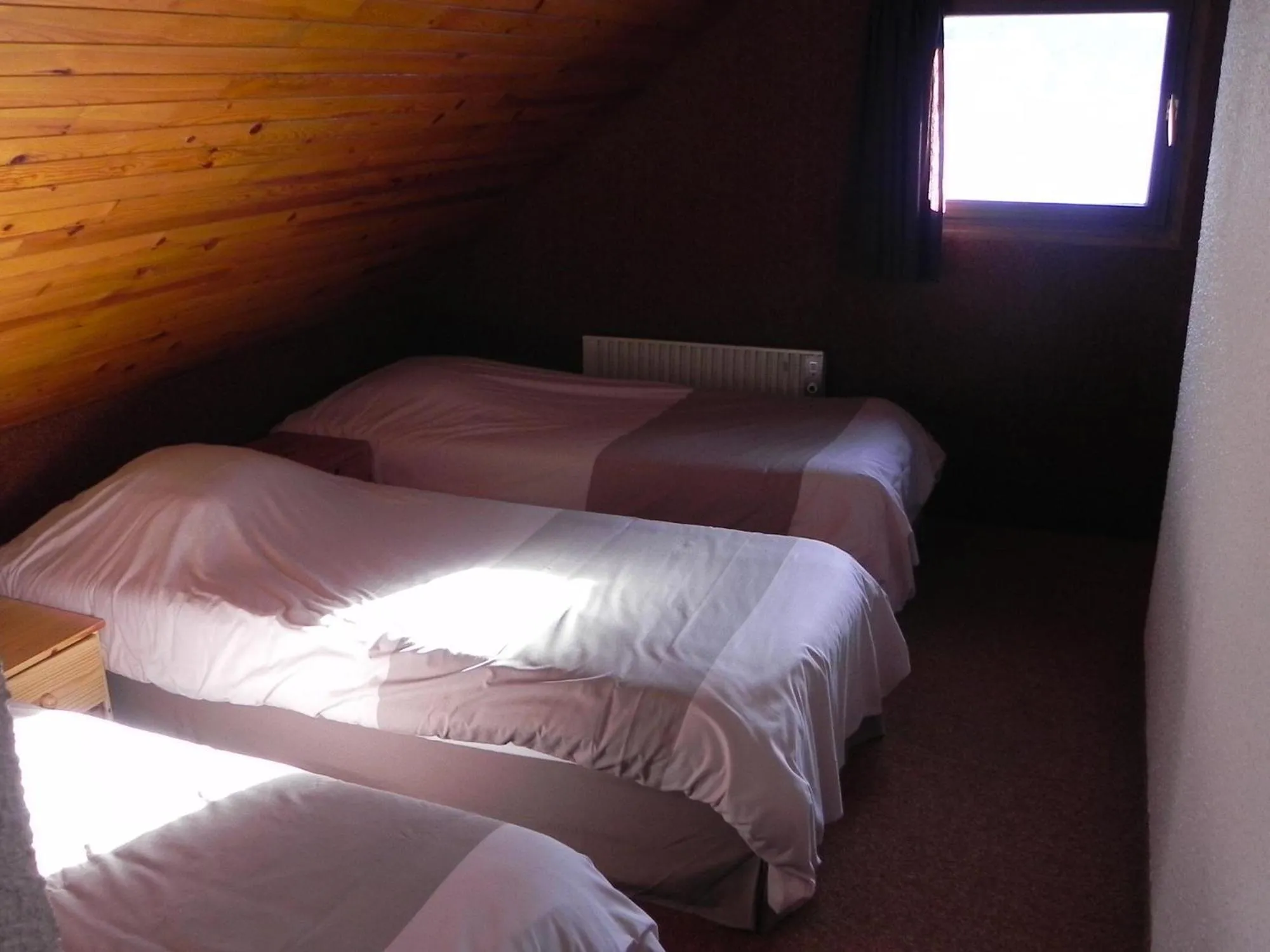 Bed in Hôtel Résidence Les Colchiques