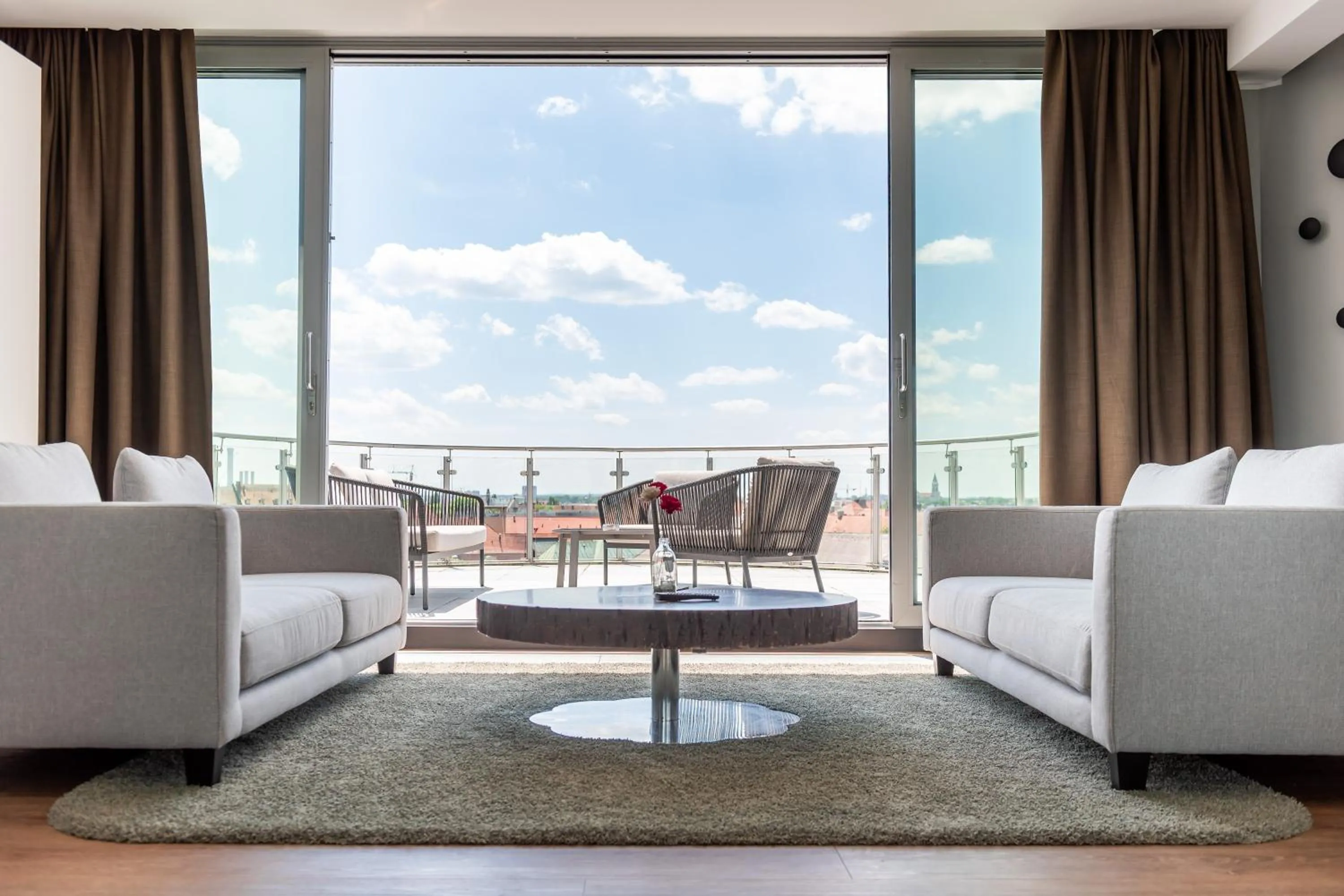 Living room in KOOS Hotel&Apartments - City Aparthotel