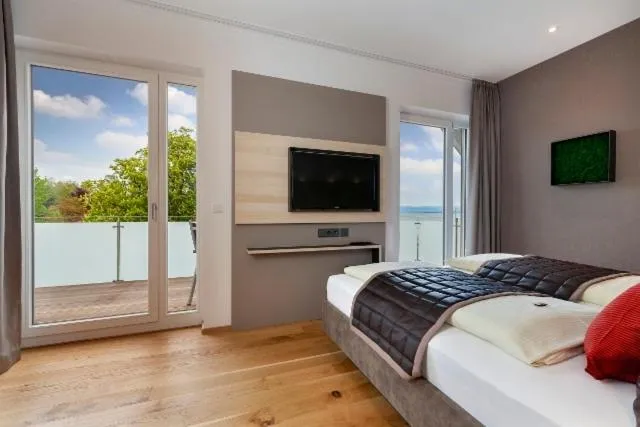 Photo of the whole room, Bed in Boutiquehotel zur Winzerstube - Adults Only