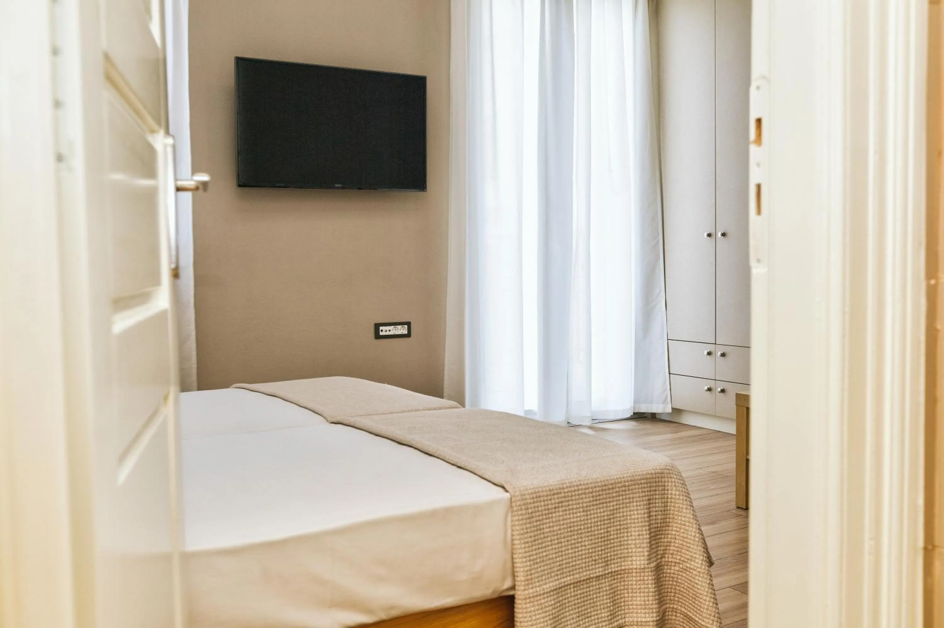Bed in Casa Mia Apartments