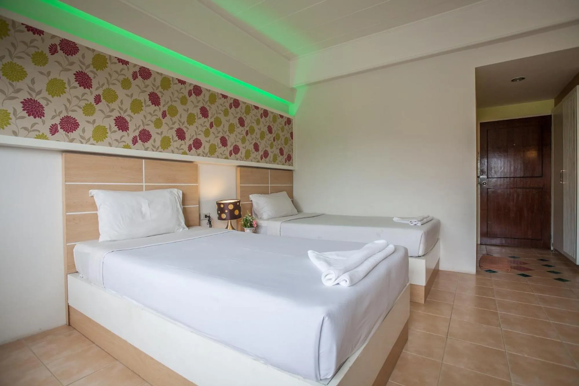 Bed in The Greenery Hotel