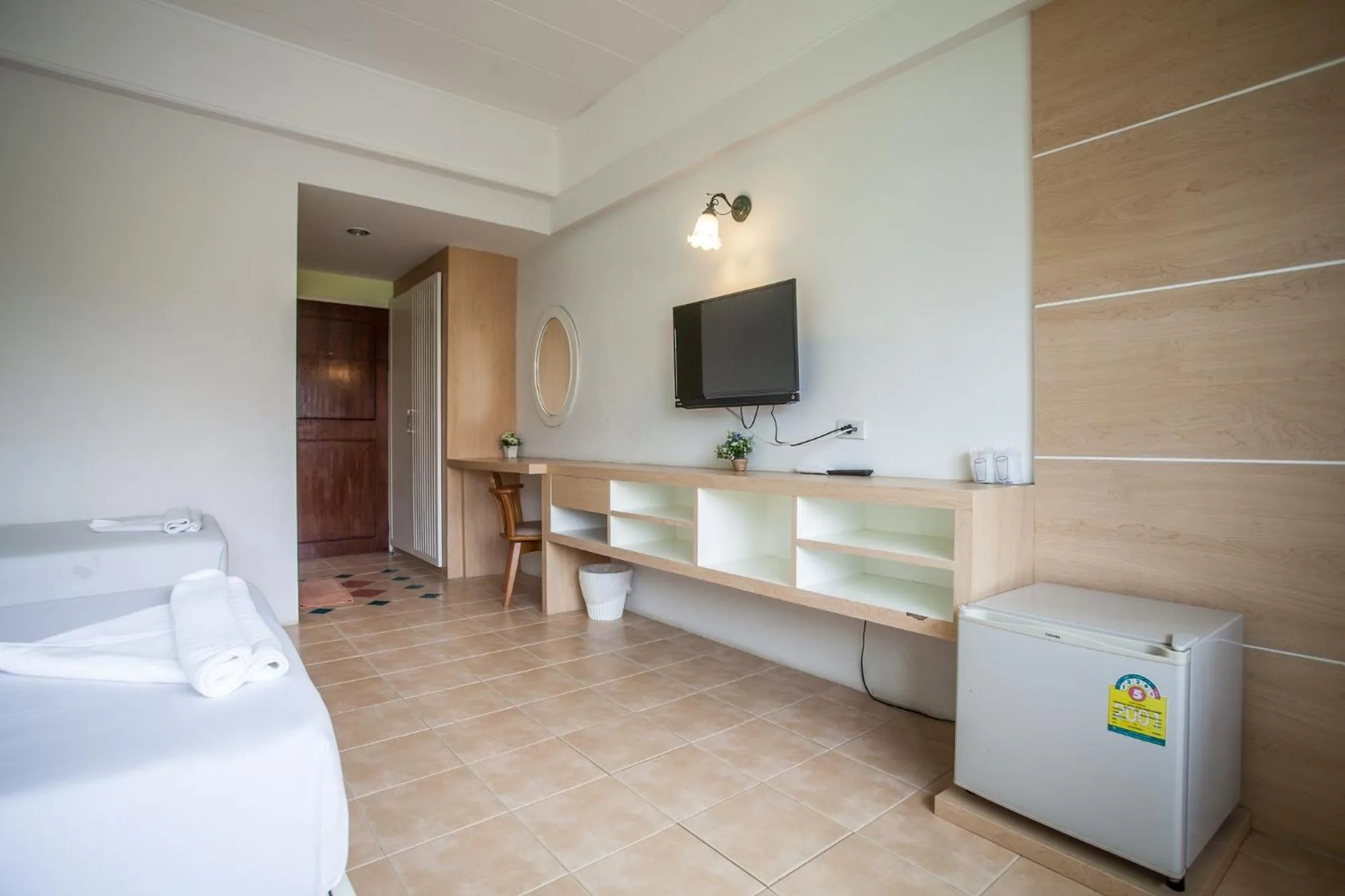 Bed in The Greenery Hotel