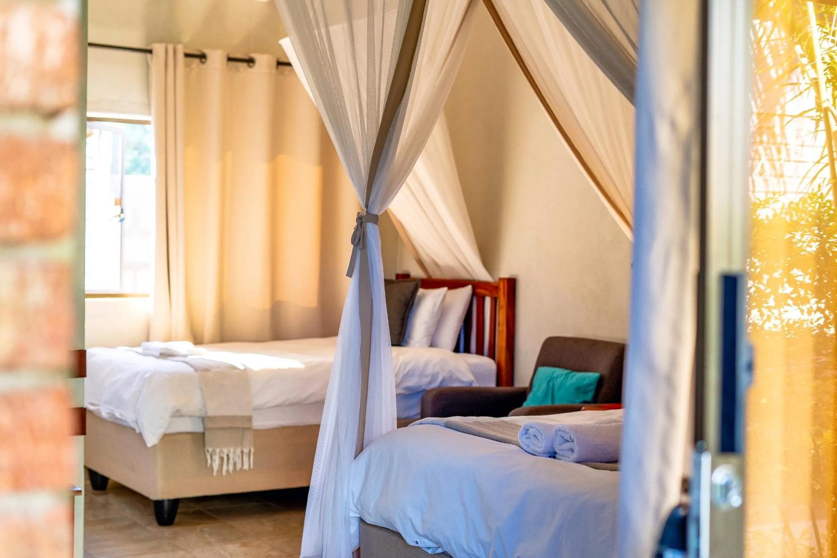 Bed in Dzimbahwe Guest Lodge