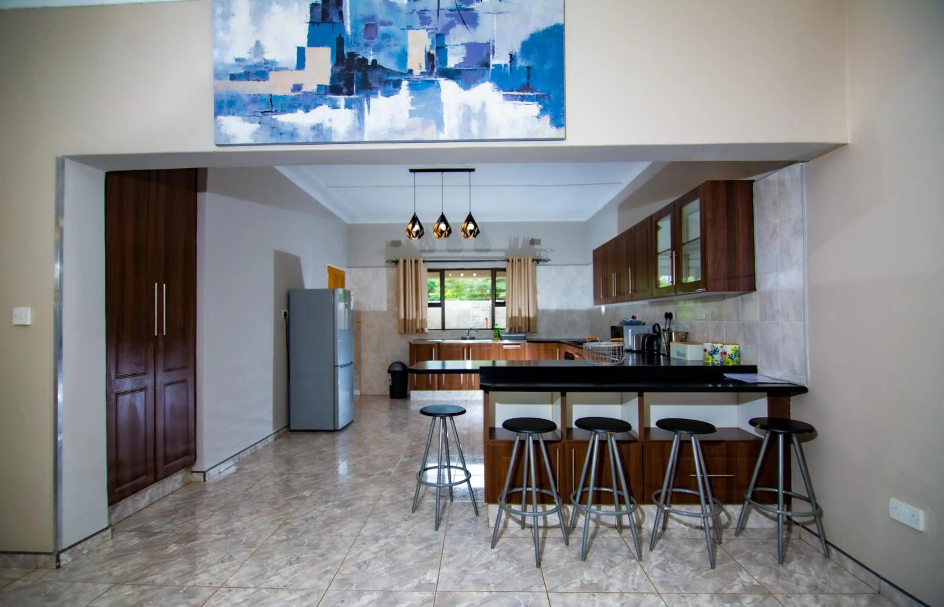 Kitchen or kitchenette in Dzimbahwe Guest Lodge