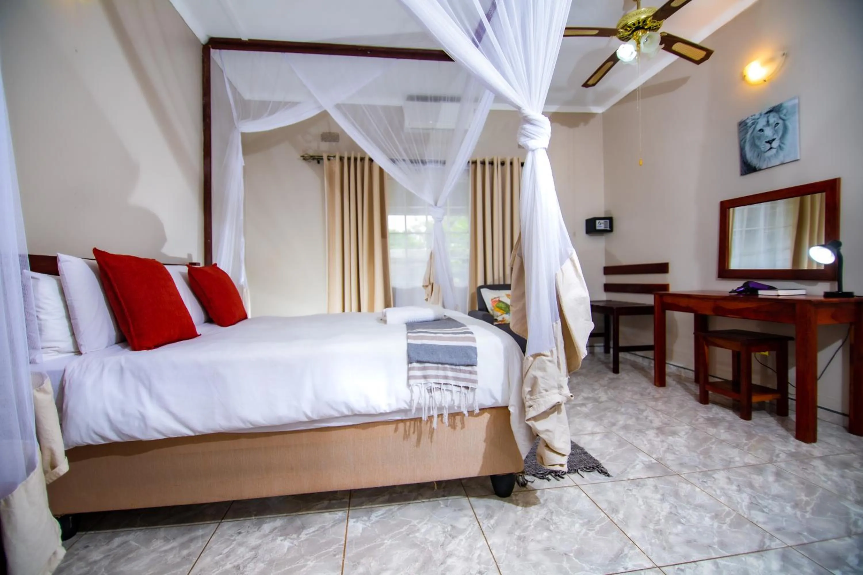 Bed in Dzimbahwe Guest Lodge