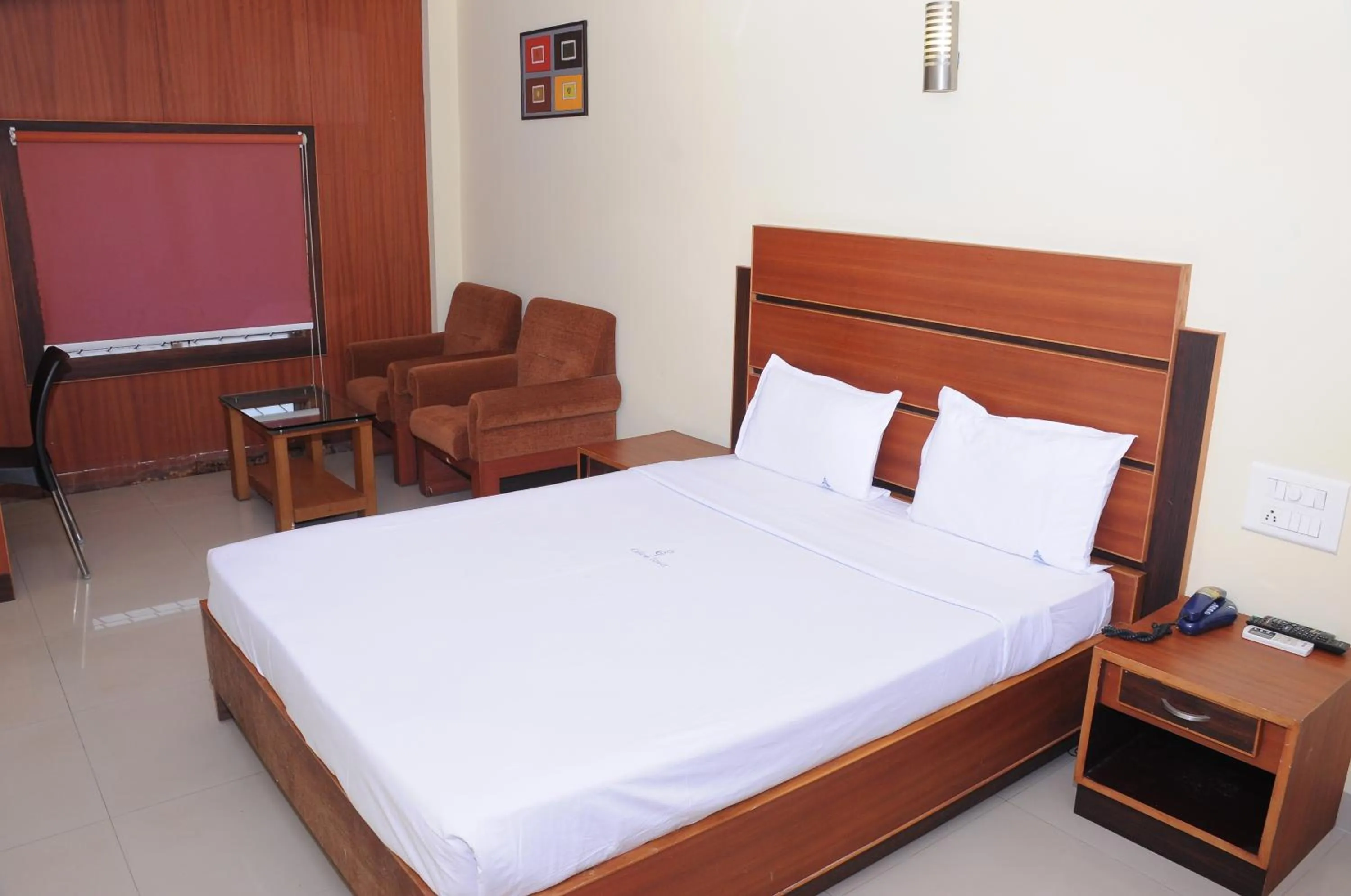 Bed in Alhind Calicut Tower