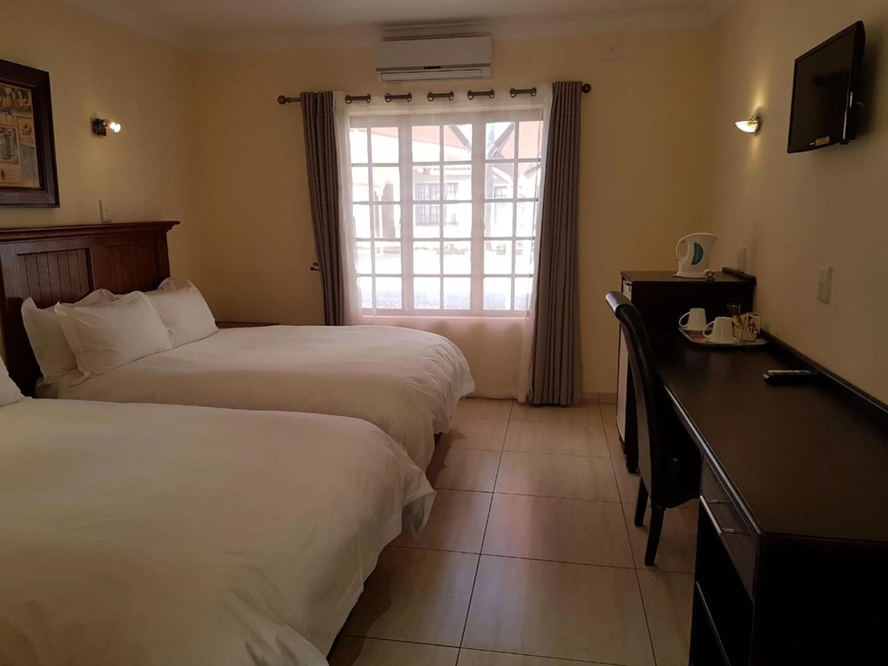 Bed in Marlot Guest House