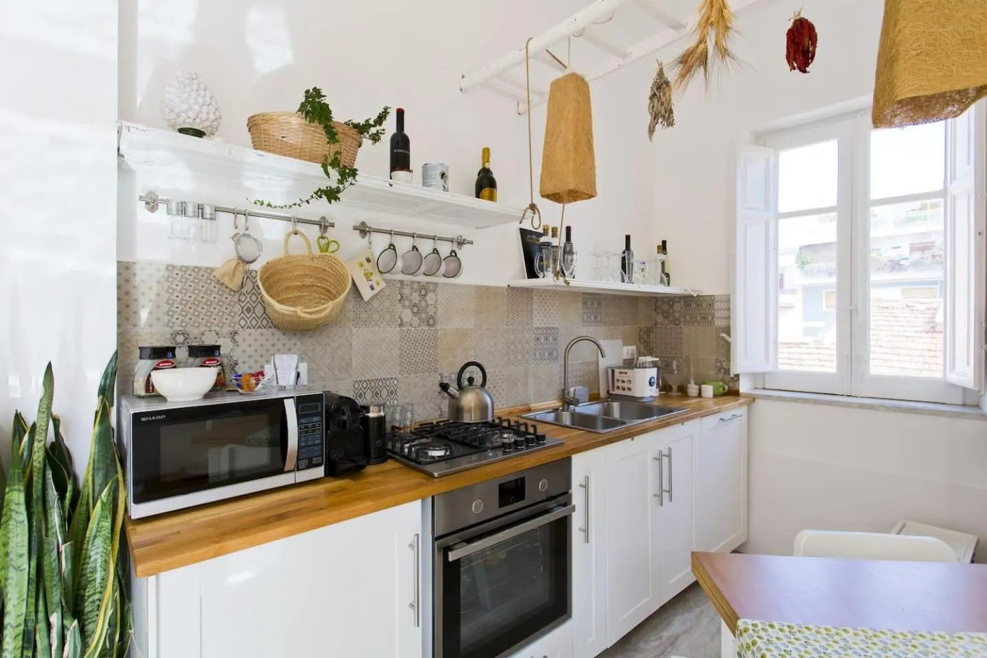 Kitchen or kitchenette in La terrazza del Sole B&B