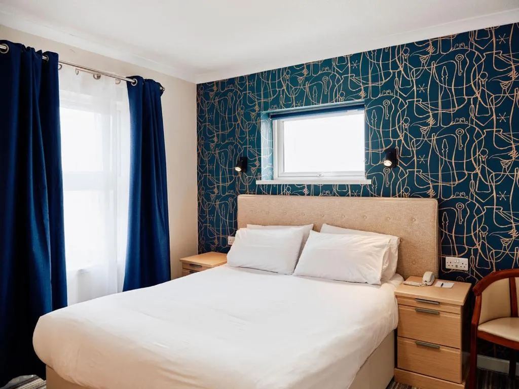 Bed in Hotel De Normandie