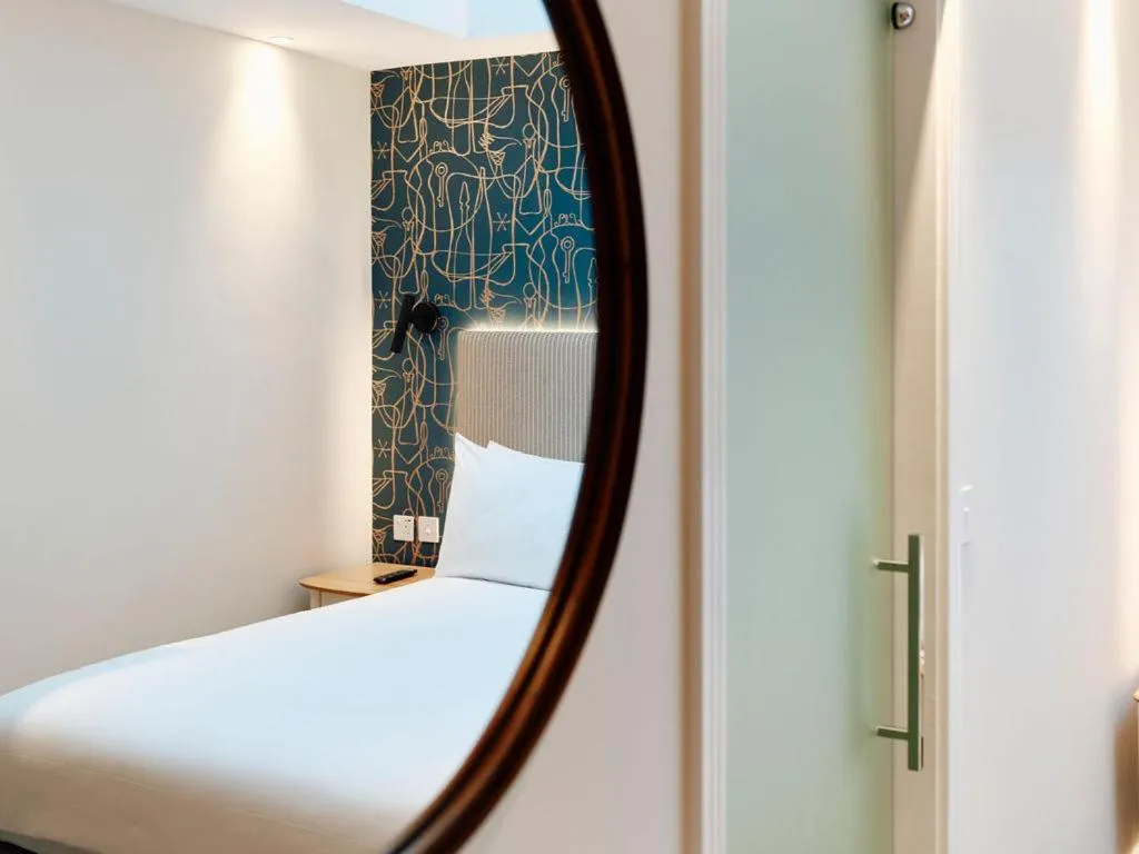 Decorative detail, Bed in Hotel De Normandie