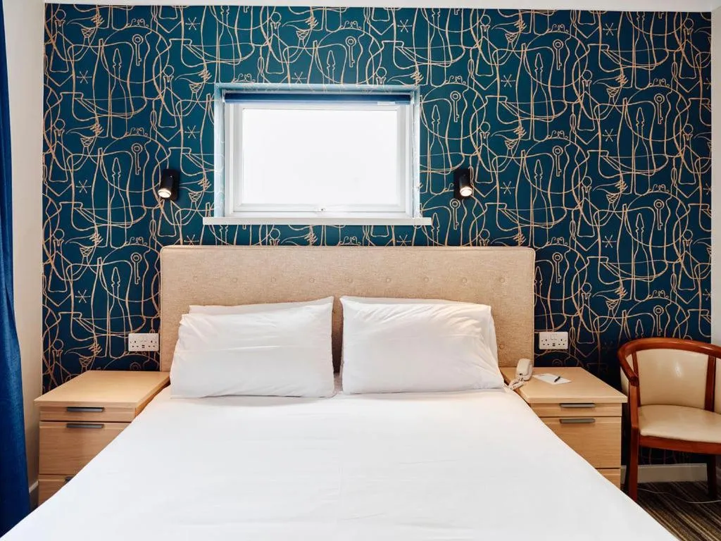 Bed in Hotel De Normandie