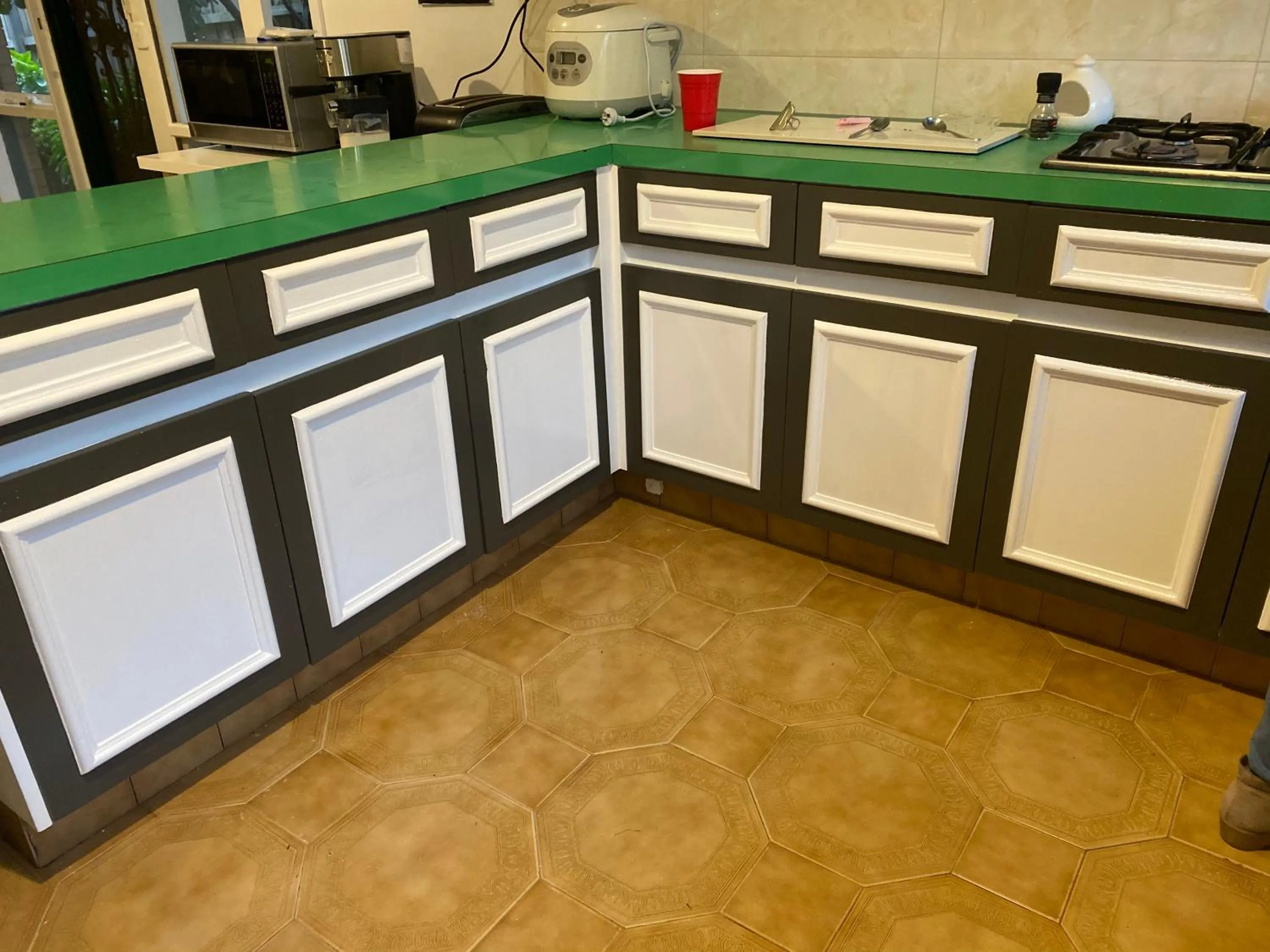 Communal kitchen in ADA Homestay