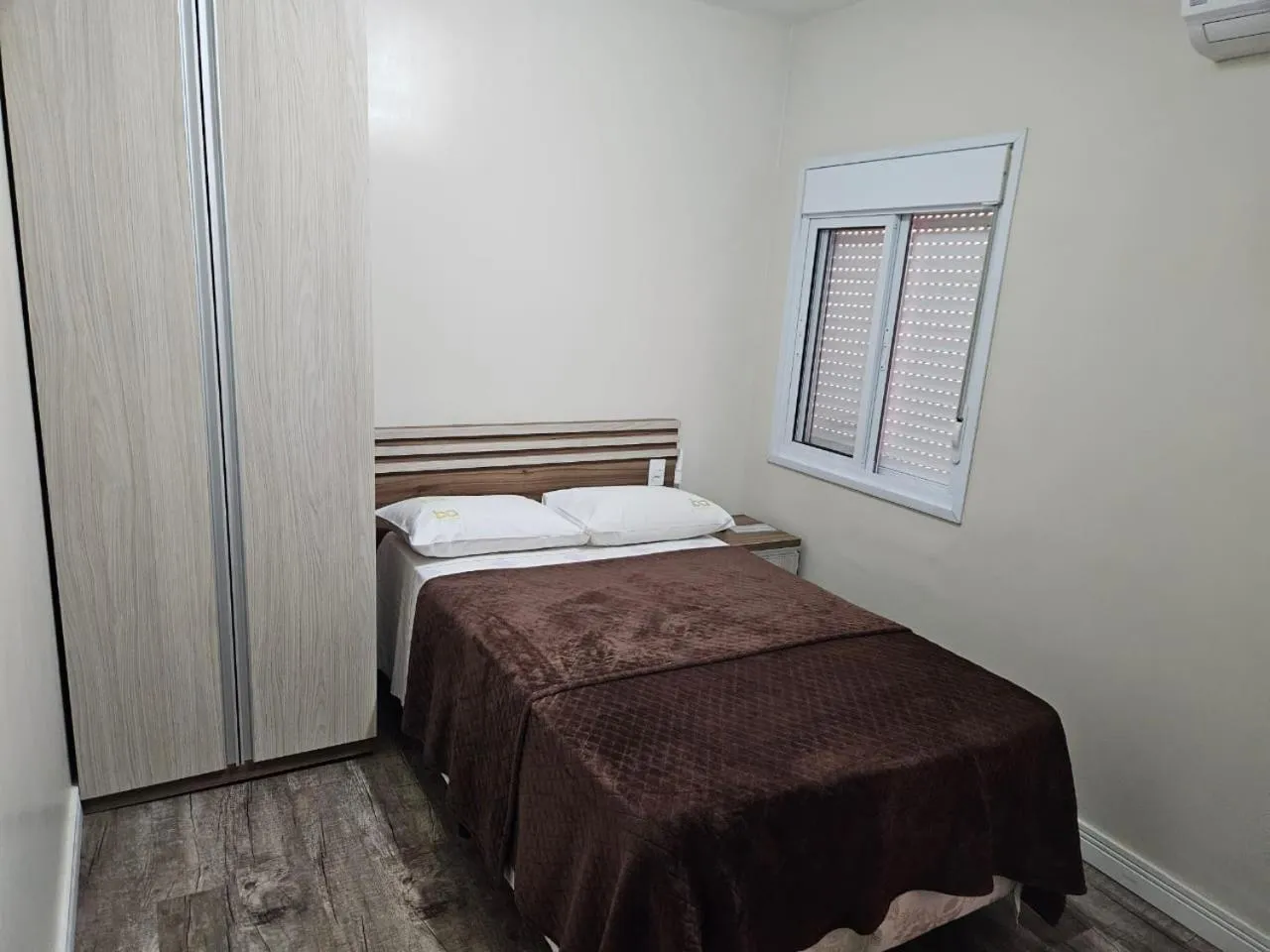 Bed in Bella Augusta Hotel