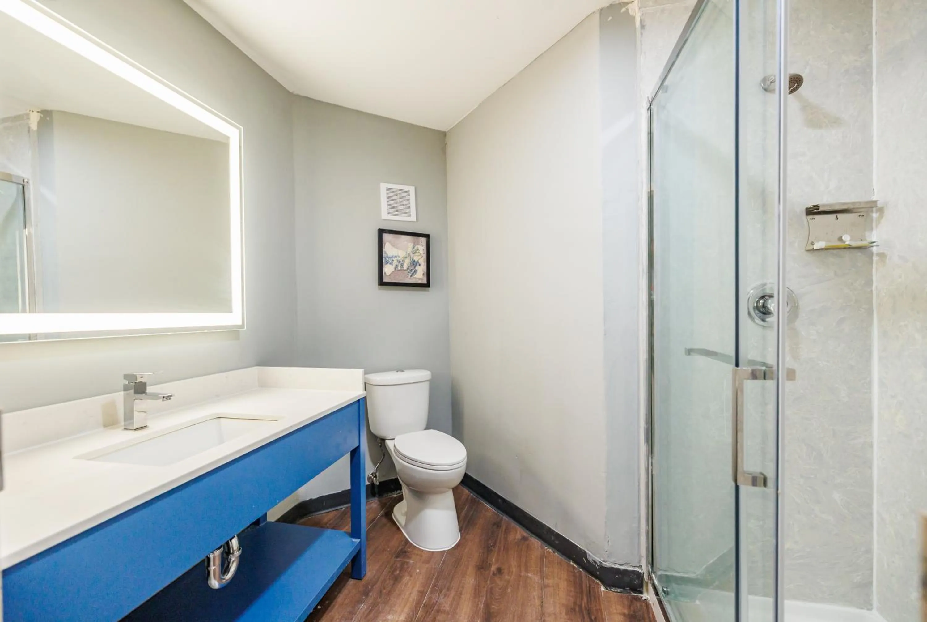 Shower in AmericInn by Wyndham Omaha Near Zoo