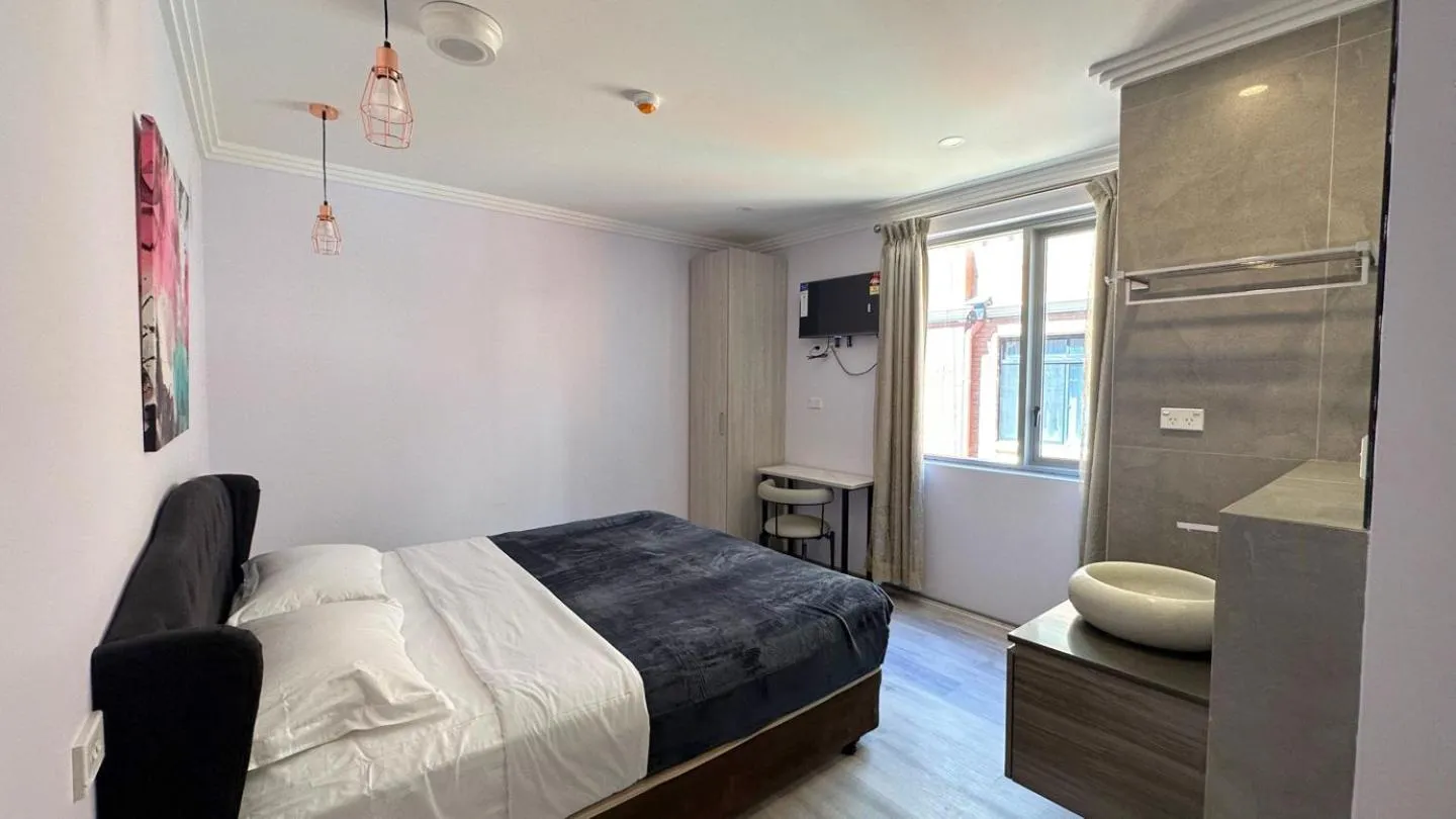 Bed in Sydney RiseOn Hotel