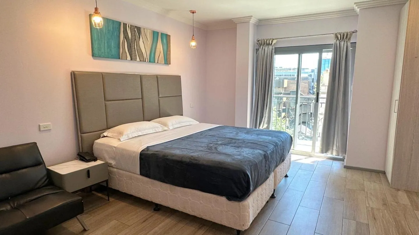 Bed in Sydney RiseOn Hotel