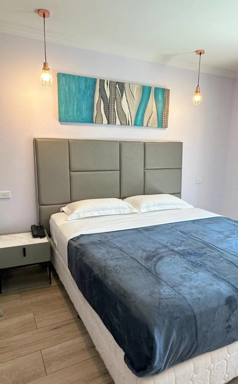 Bed in Sydney RiseOn Hotel