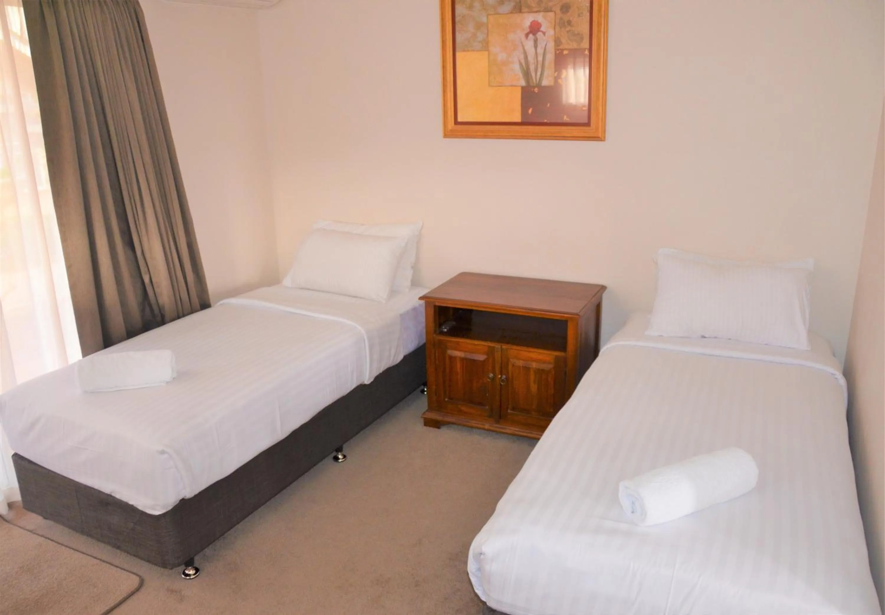 Bed in Higgins Lane Motel