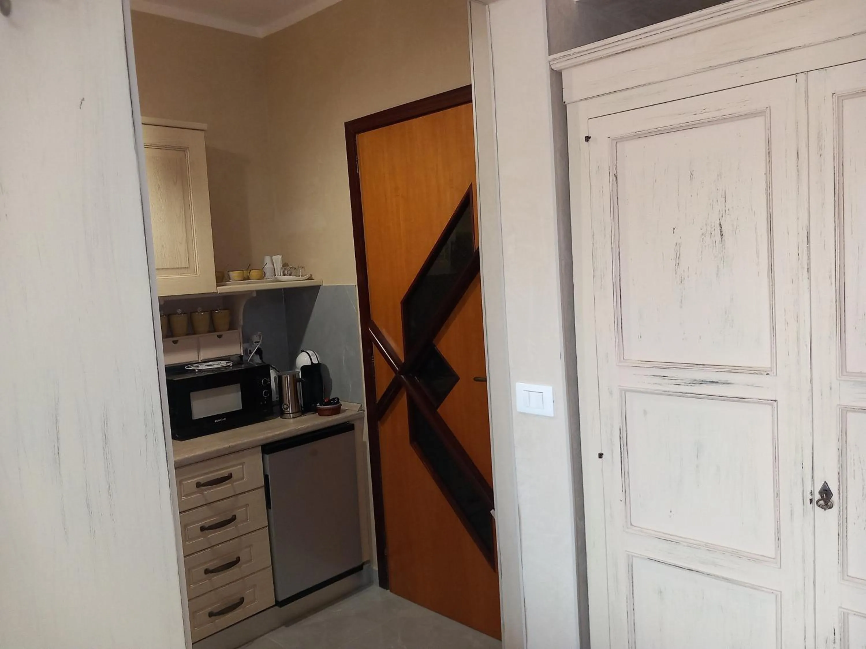 Kitchen or kitchenette in Lussuoso B&B