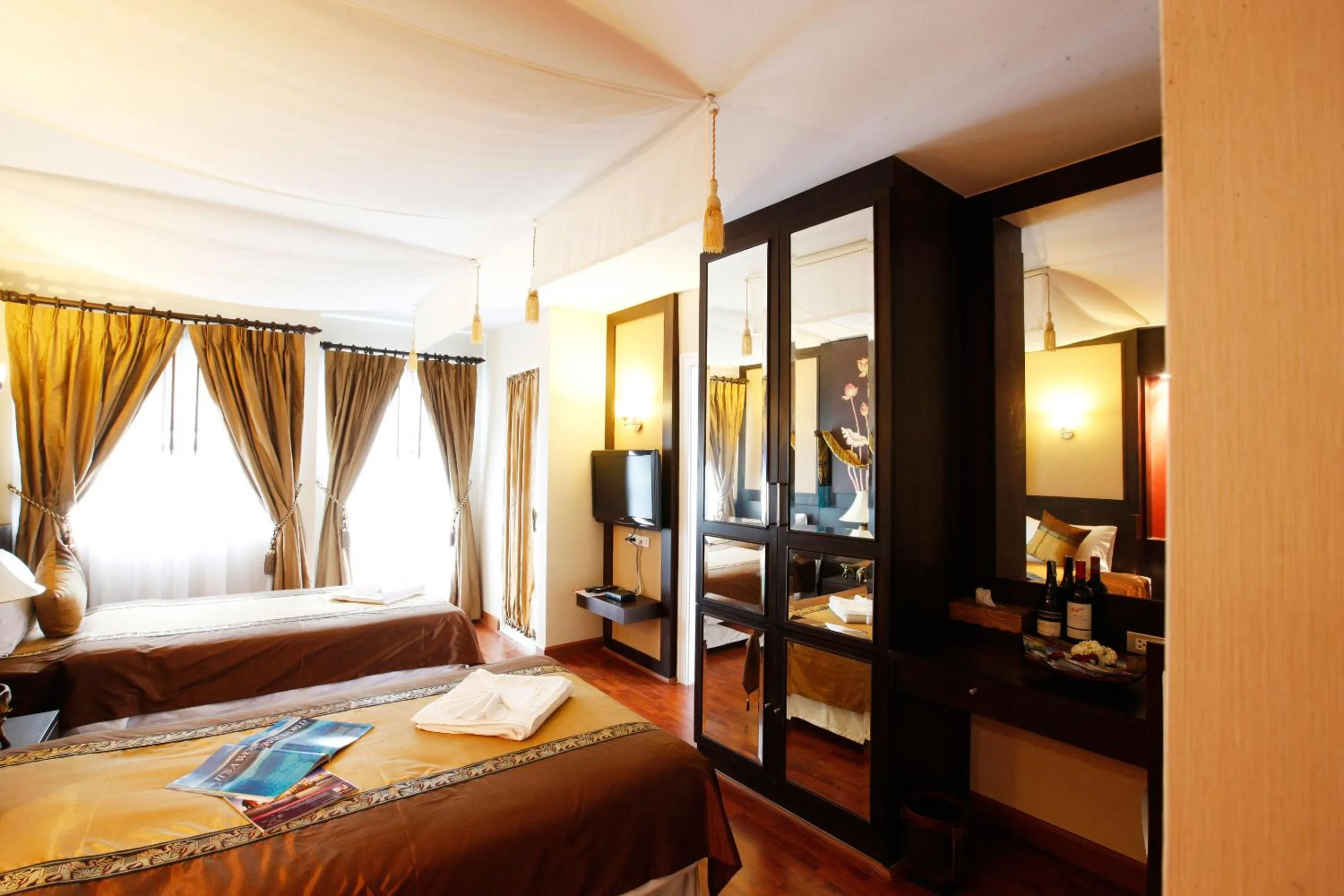 Photo of the whole room, Bed in Mirth Sathorn Hotel