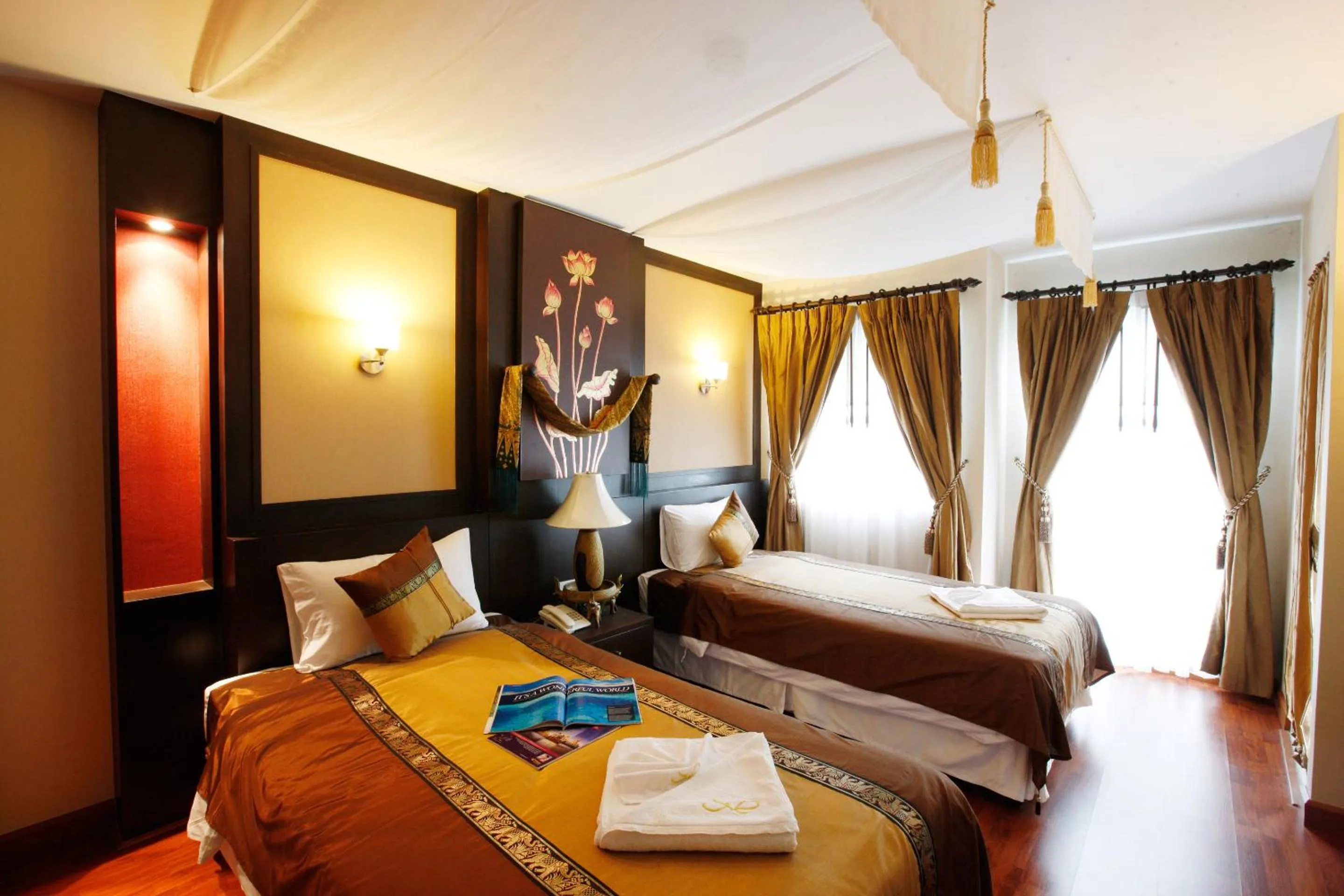 Photo of the whole room, Bed in Mirth Sathorn Hotel