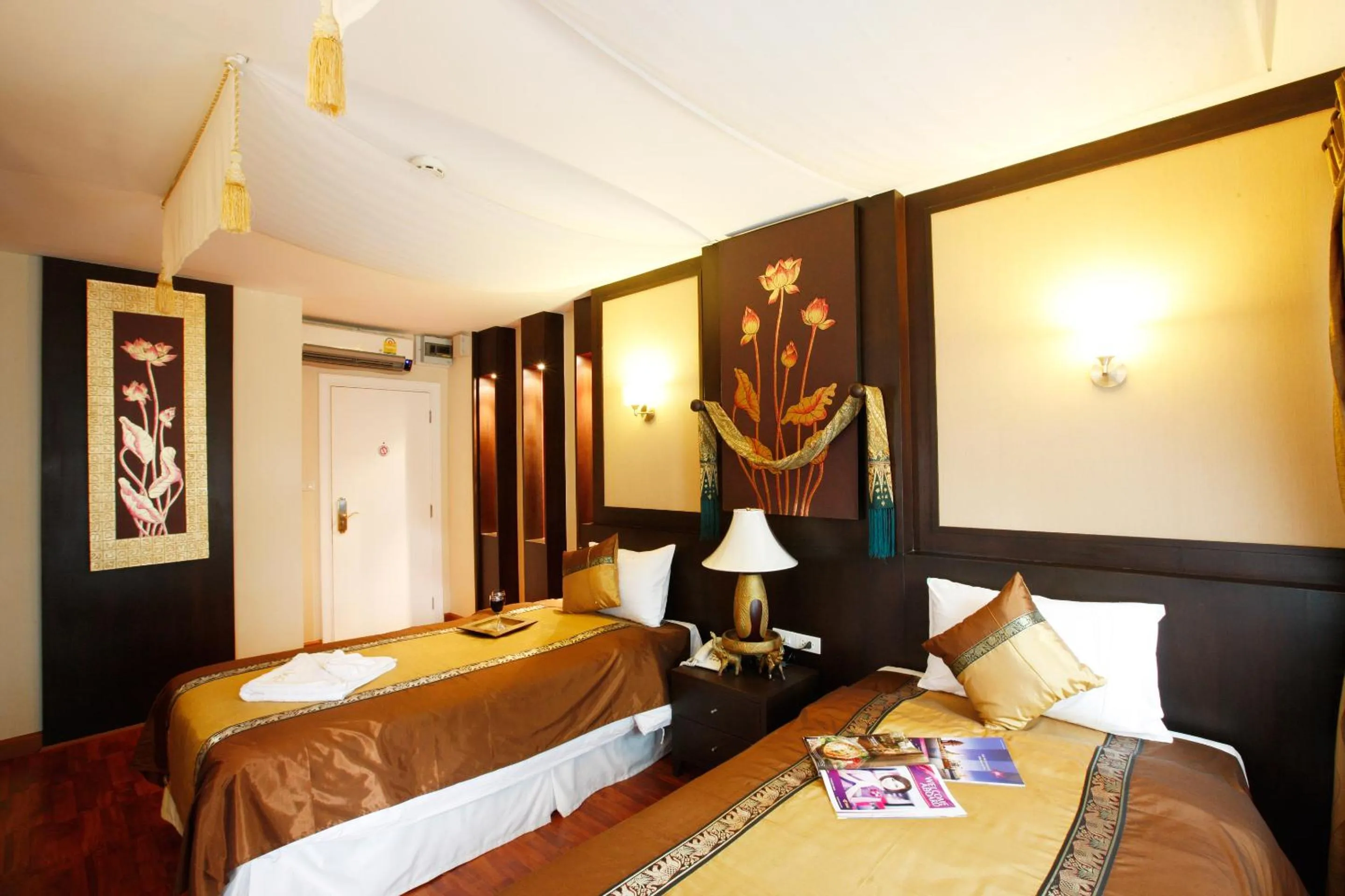 Photo of the whole room, Bed in Mirth Sathorn Hotel