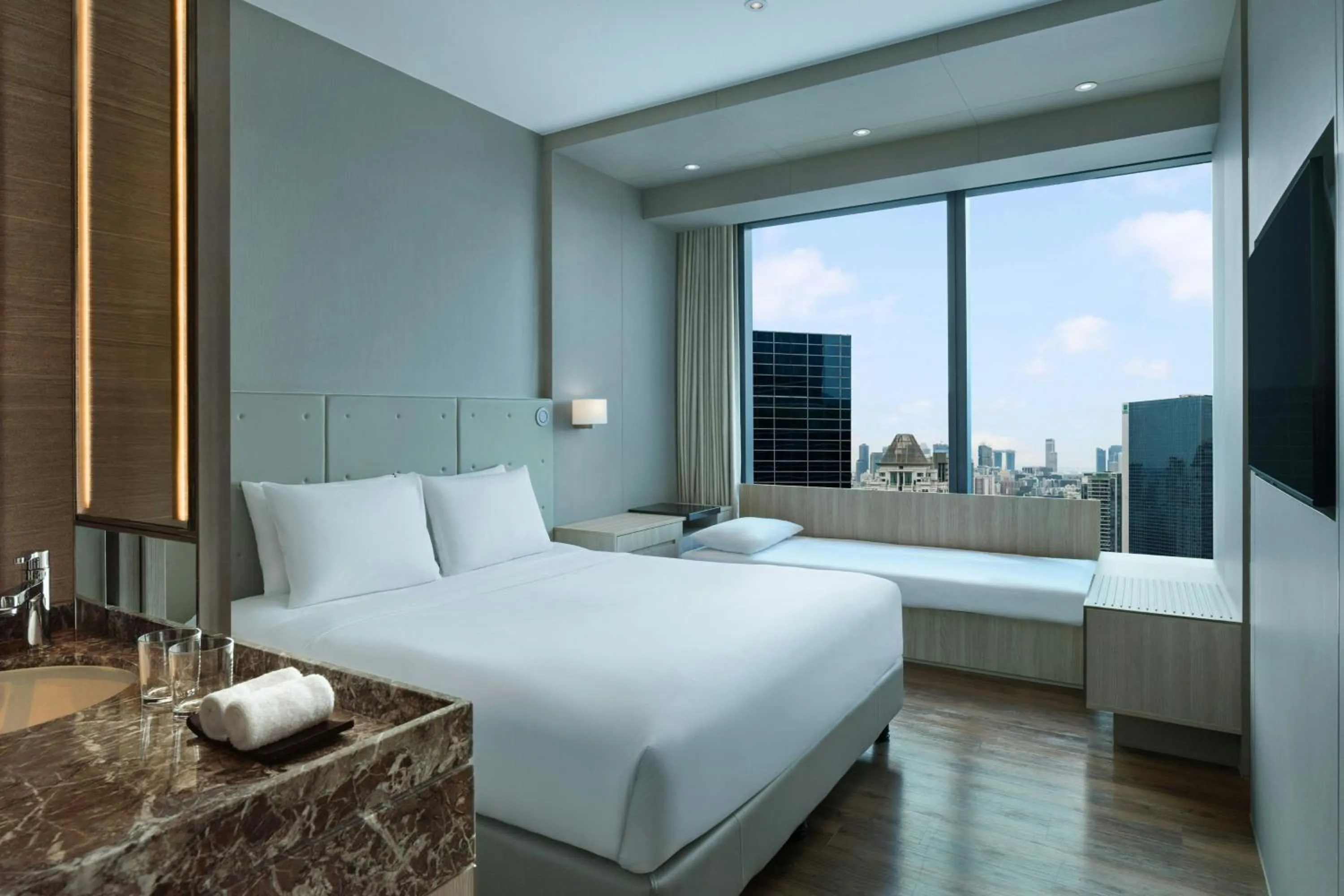 Photo of the whole room, Bed in Courtyard by Marriott Singapore Novena