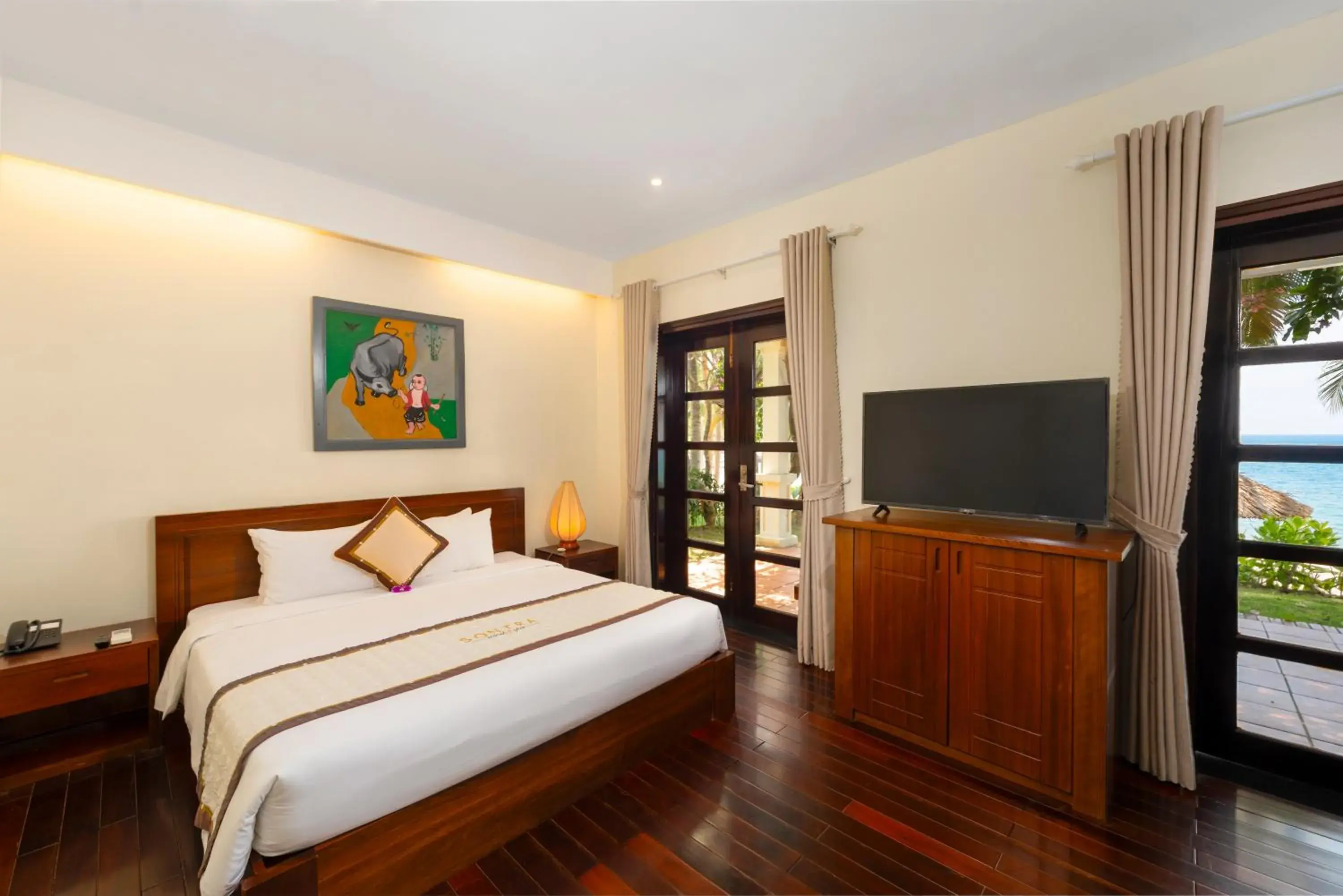 Bed in Son Tra Beach Resort & Spa Danang Bed in Son Tra Beach Resort & Spa Danang