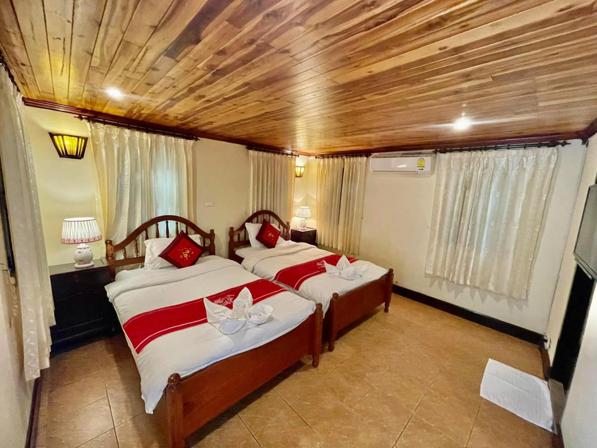 Bed in Villa Phathana Boutique Hotel