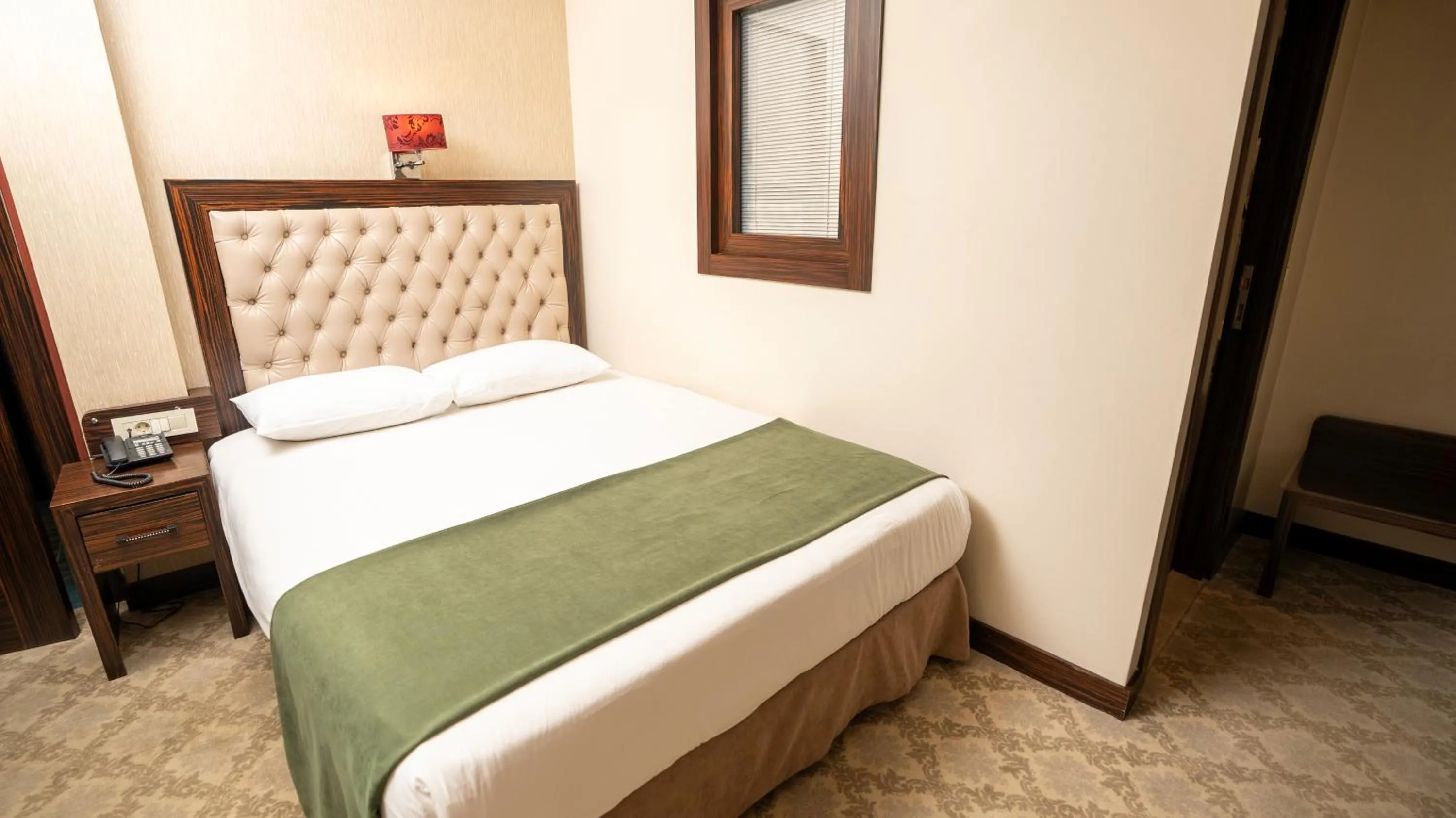Bed in Golden Siyav Hotel