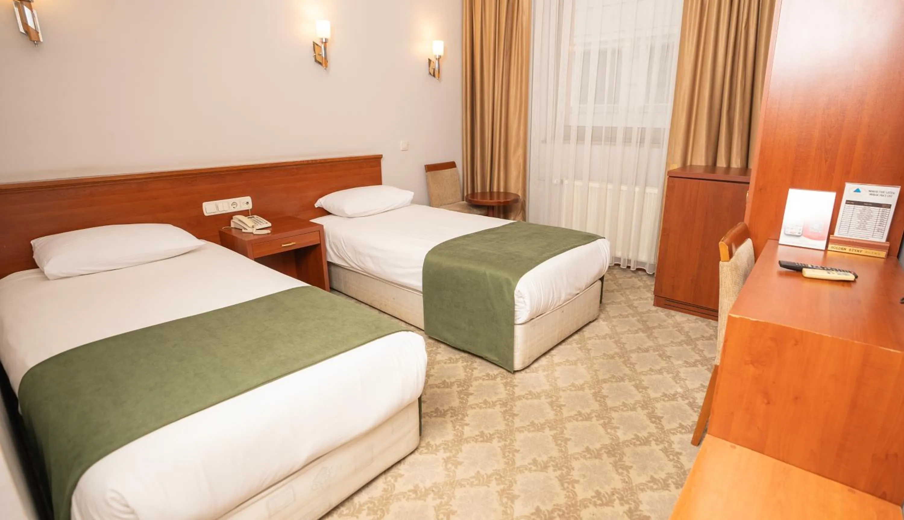 Bed in Golden Siyav Hotel